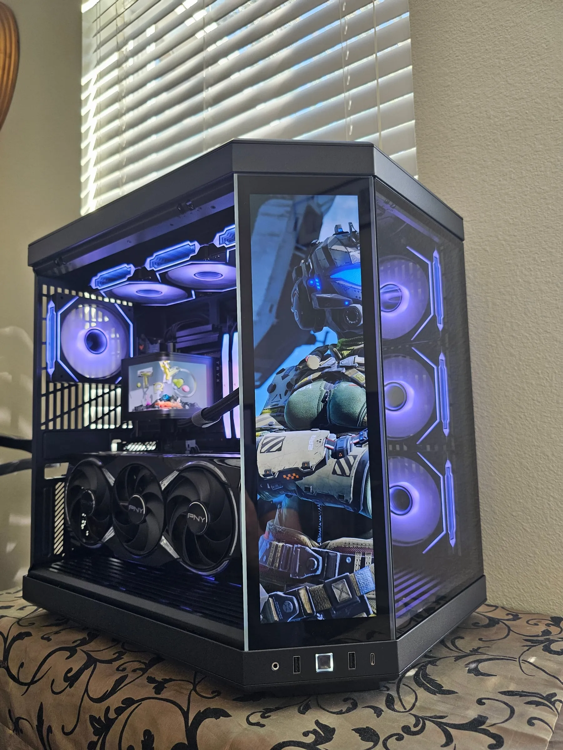 Y70 Touch in violet — Titanfall pilot on the front touchscreen, TRYX AMOLED running art, PNY card below