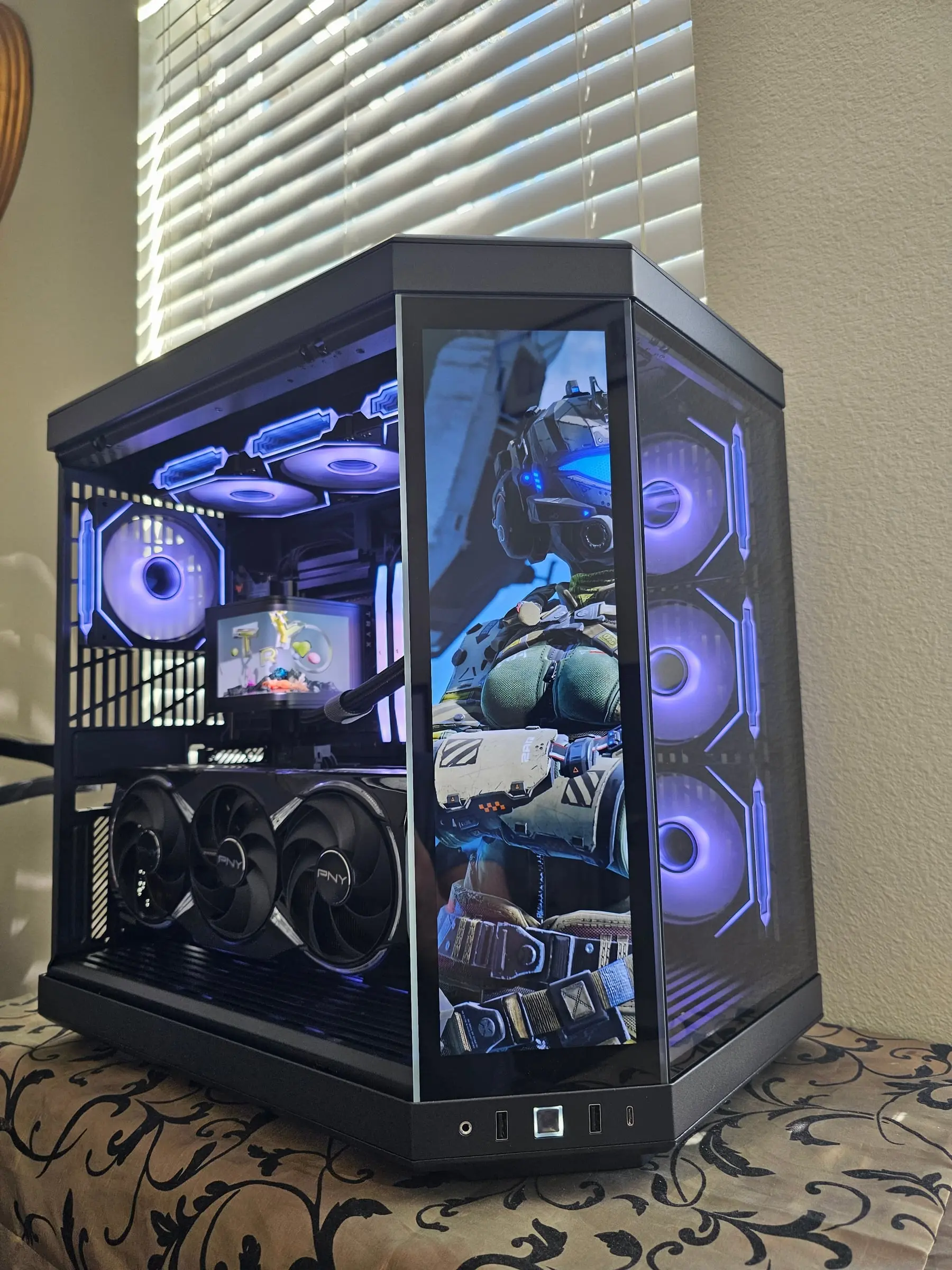 Y70 Touch in violet — Titanfall pilot on the front touchscreen, TRYX AMOLED running art, PNY card below