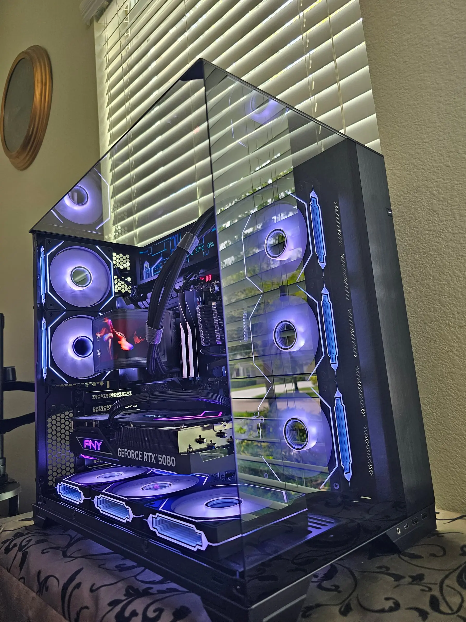 Violet theme through the pillarless glass corner — Trofeo strip, curved TRYX AMOLED, and the PNY 5080 lit pink