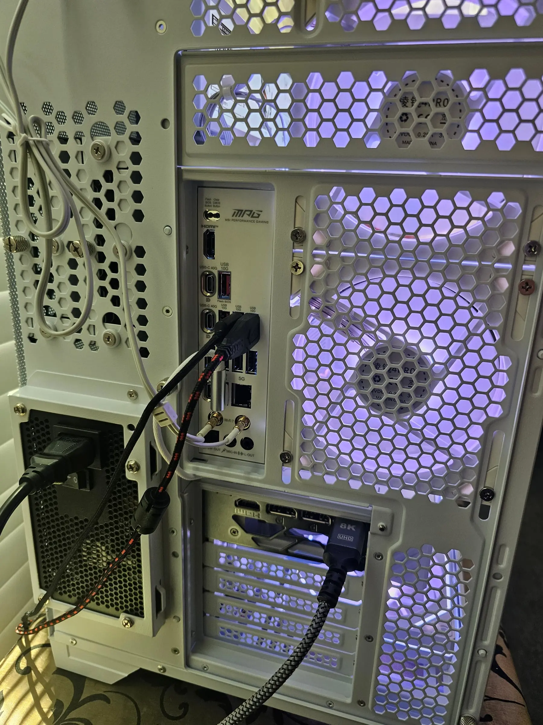 Rear I/O — dual 40G USB-C, 5G LAN, and Wi-Fi 7 antennas on the white Edge Ti board