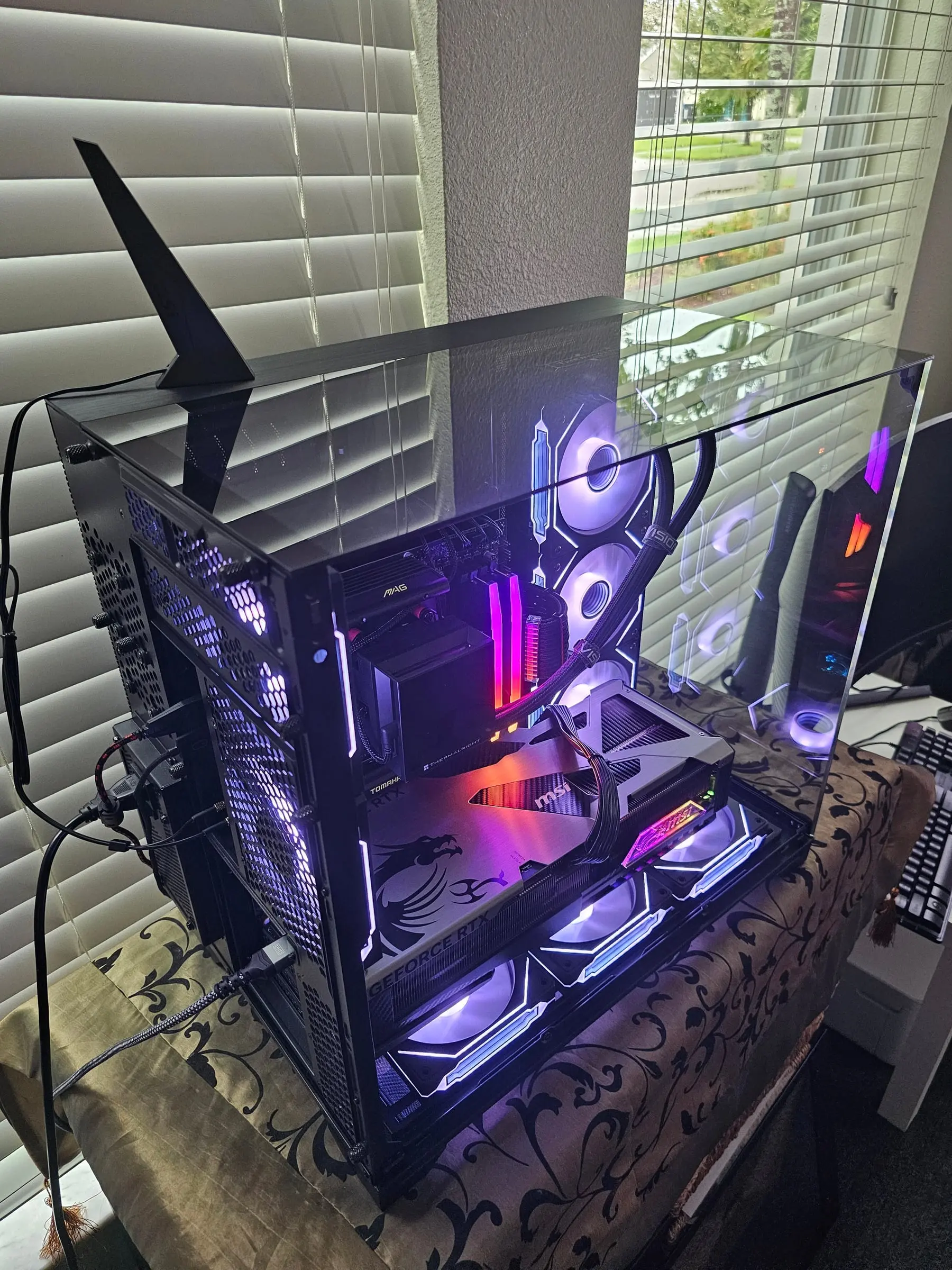 Top rear angle showing the Wi-Fi antenna, sleeved cables, and the Vanguard's dragon backplate in purple light