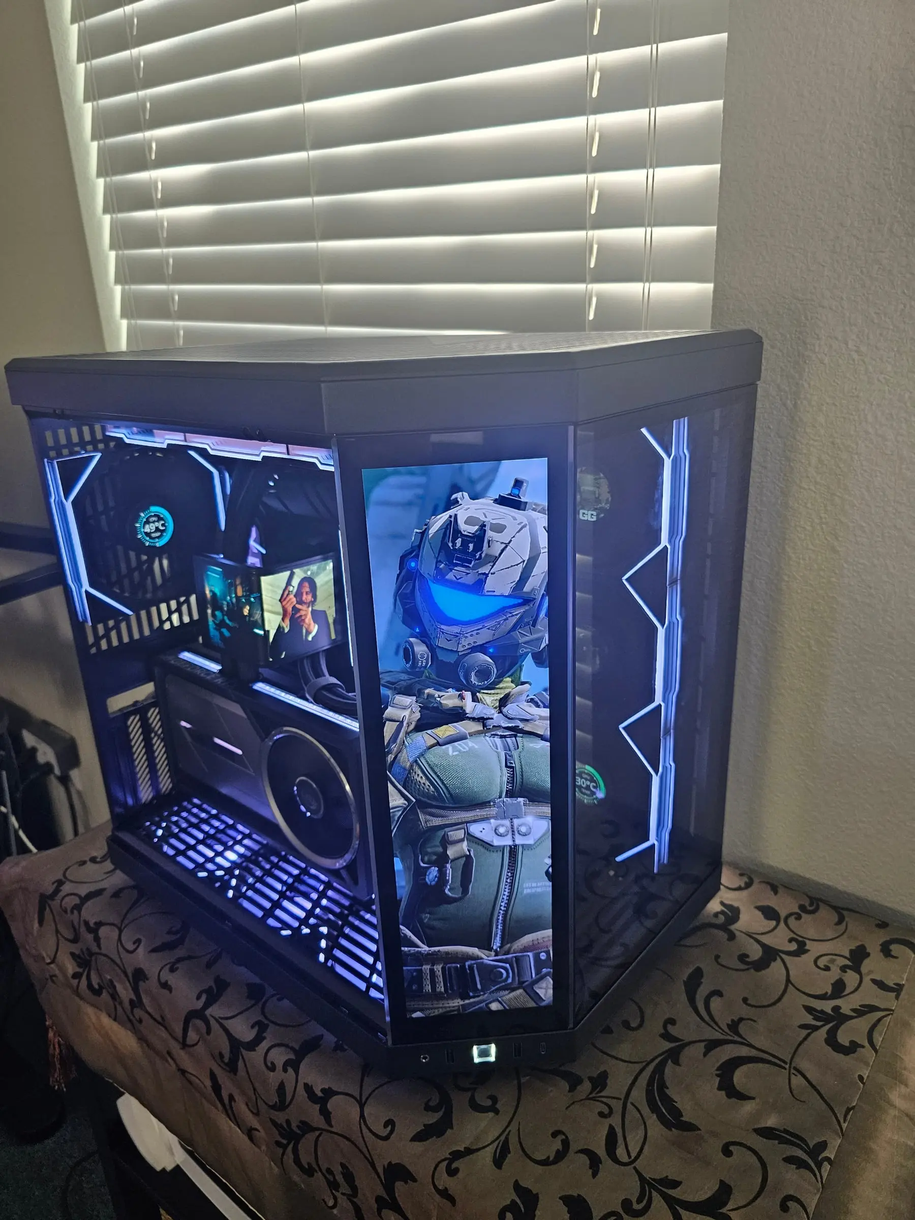 White-blue theme, Titanfall pilot art on the front touchscreen beside the hex-lit side fans