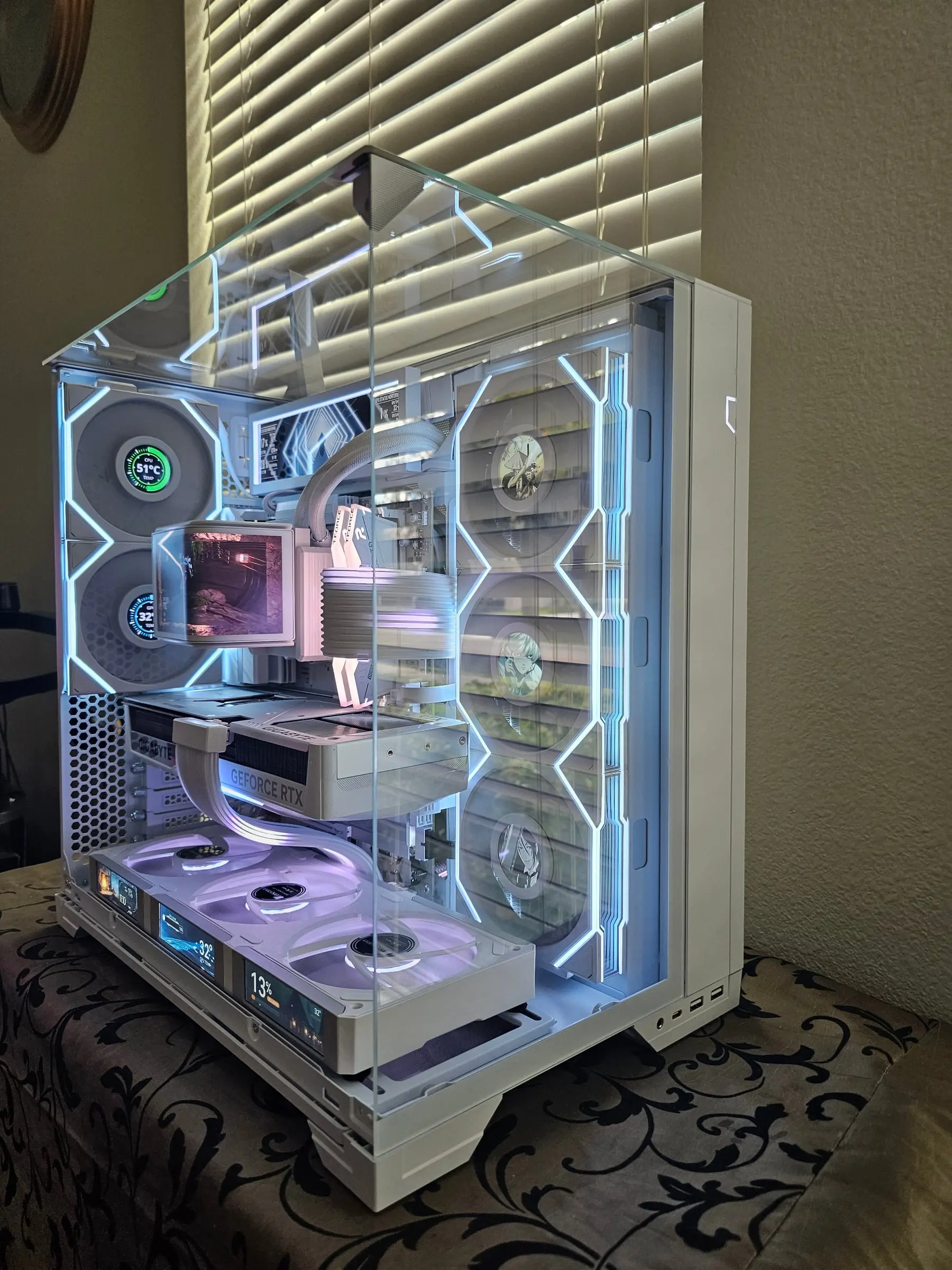 Ice theme with anime portraits on the TL LCD fans and the Eagle card behind glass