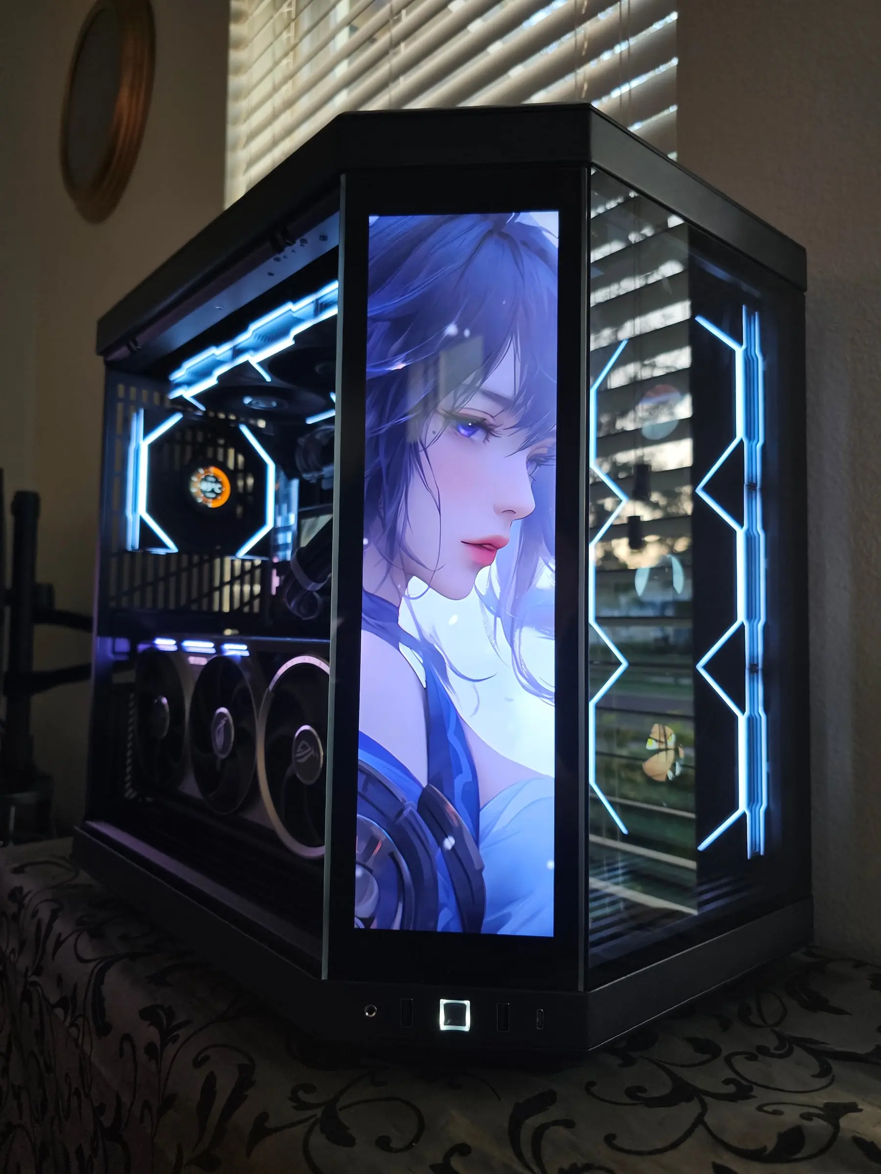 Blue anime portrait on the front screen with the Astral card visible through the glass