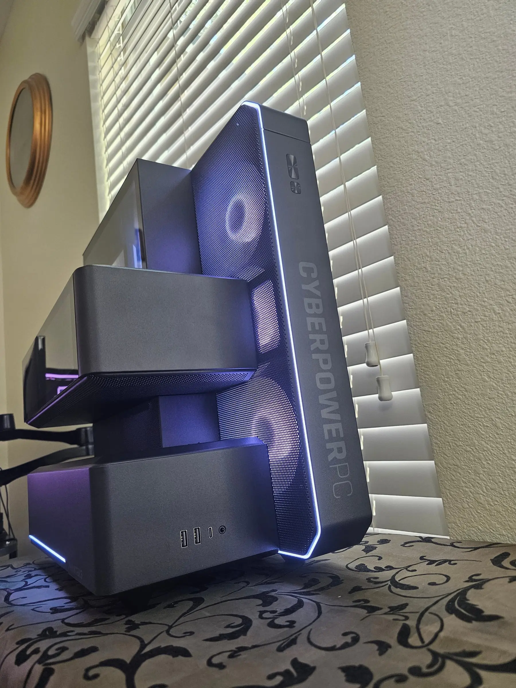 Side profile of the fan tower with CyberPowerPC lettering and staggered module silhouettes