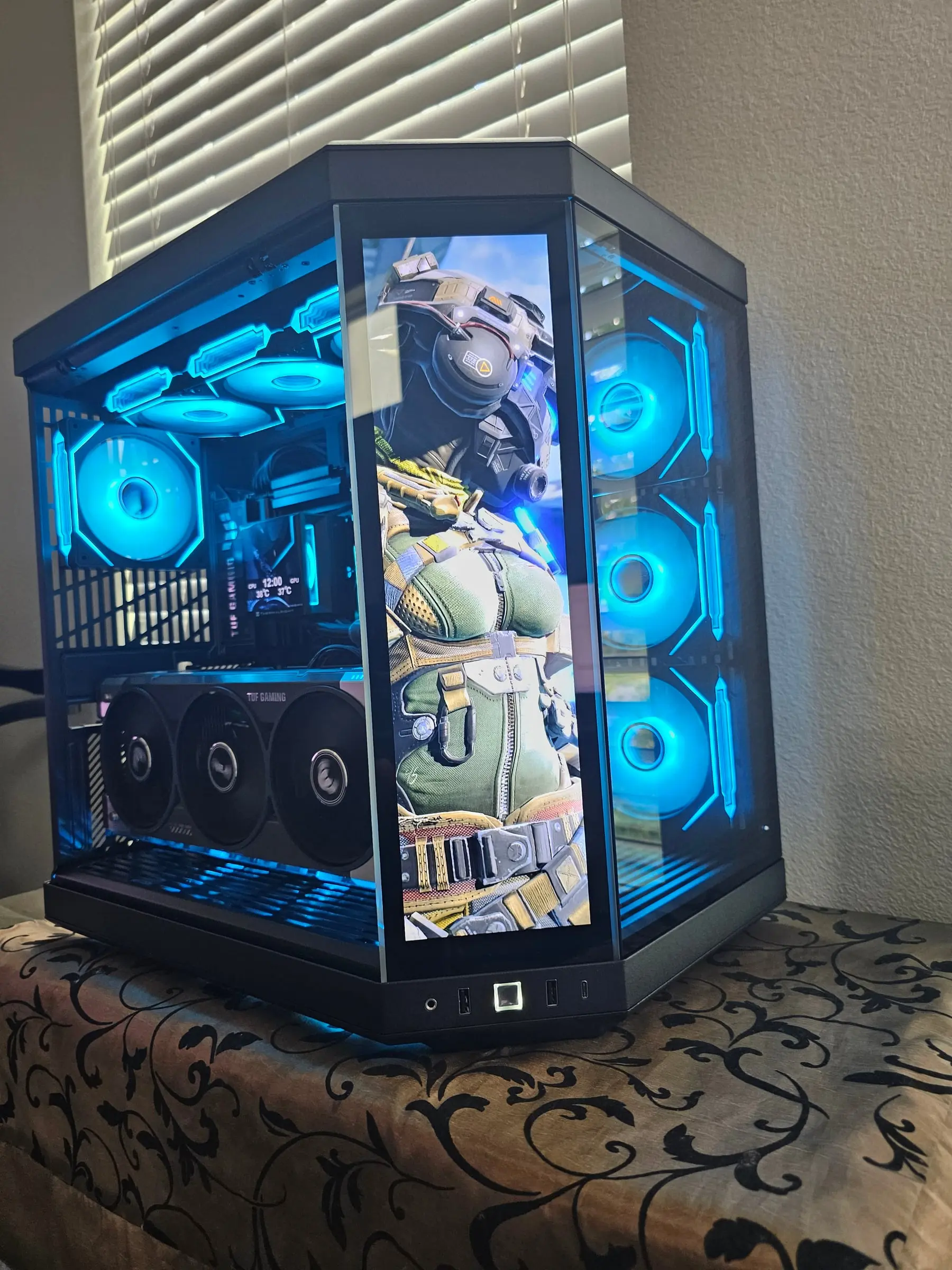 Blue theme with Titanfall pilot art on the front display and Prism fans lit behind glass