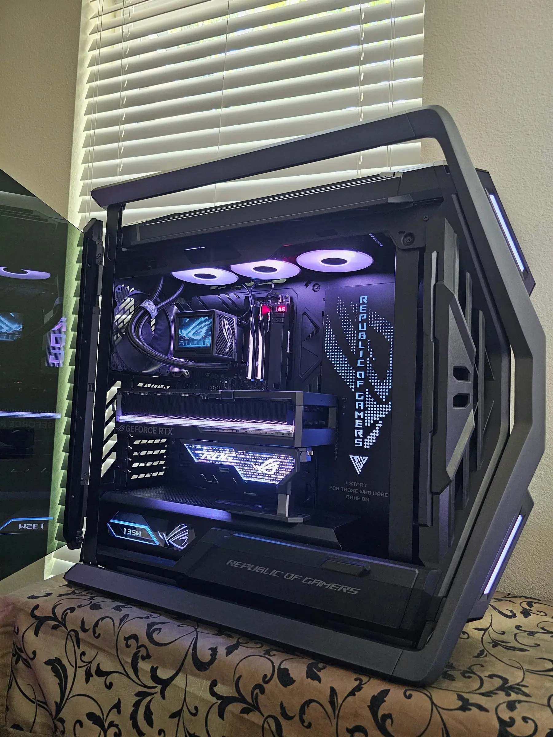 Interior in ice blue — Ryujin III LCD, Astral RTX 5090 on the Herculx bracket, and the 'for those who dare' ROG panel
