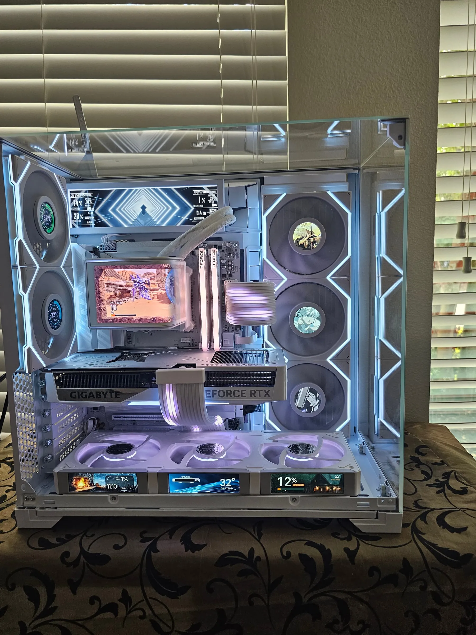 All ten screens at once — 8.8-inch dashboard, curved OLED on the loop, three floor screen-fans, and LCD fans with anime art