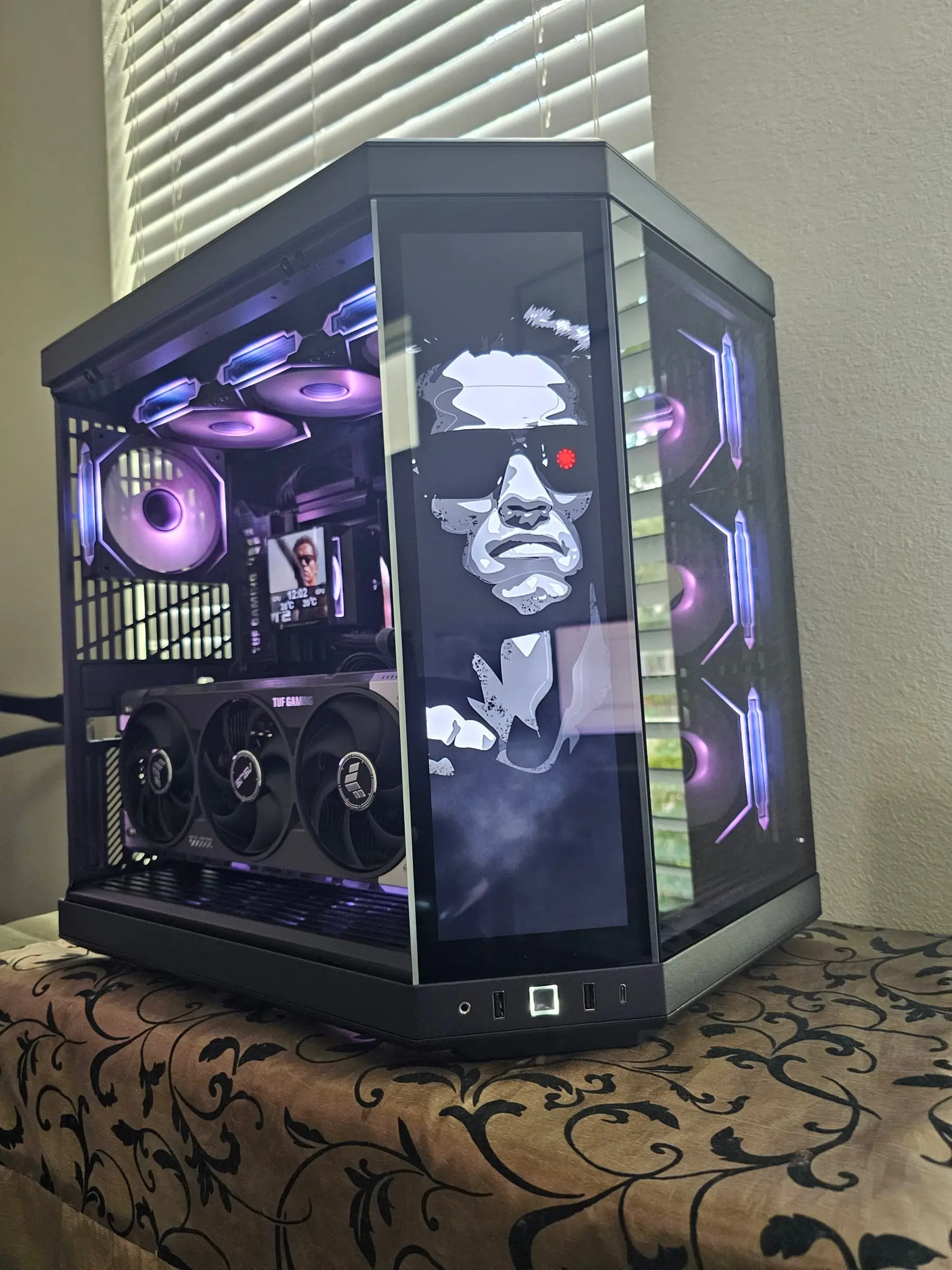 Purple theme with Terminator T-800 art across the Y70 front touchscreen