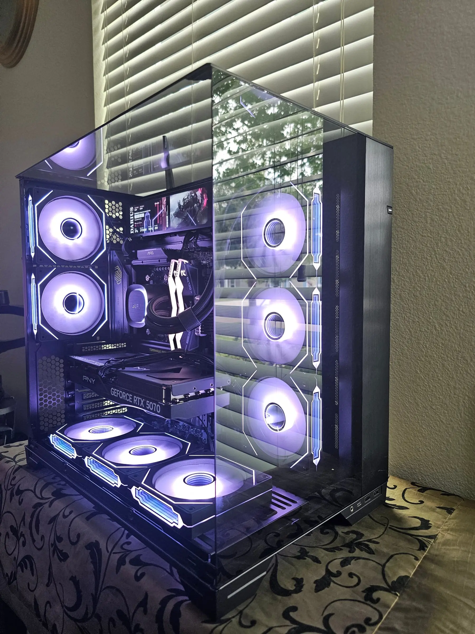 Clean white lighting across the infinity-mirror fans and the RTX 5070