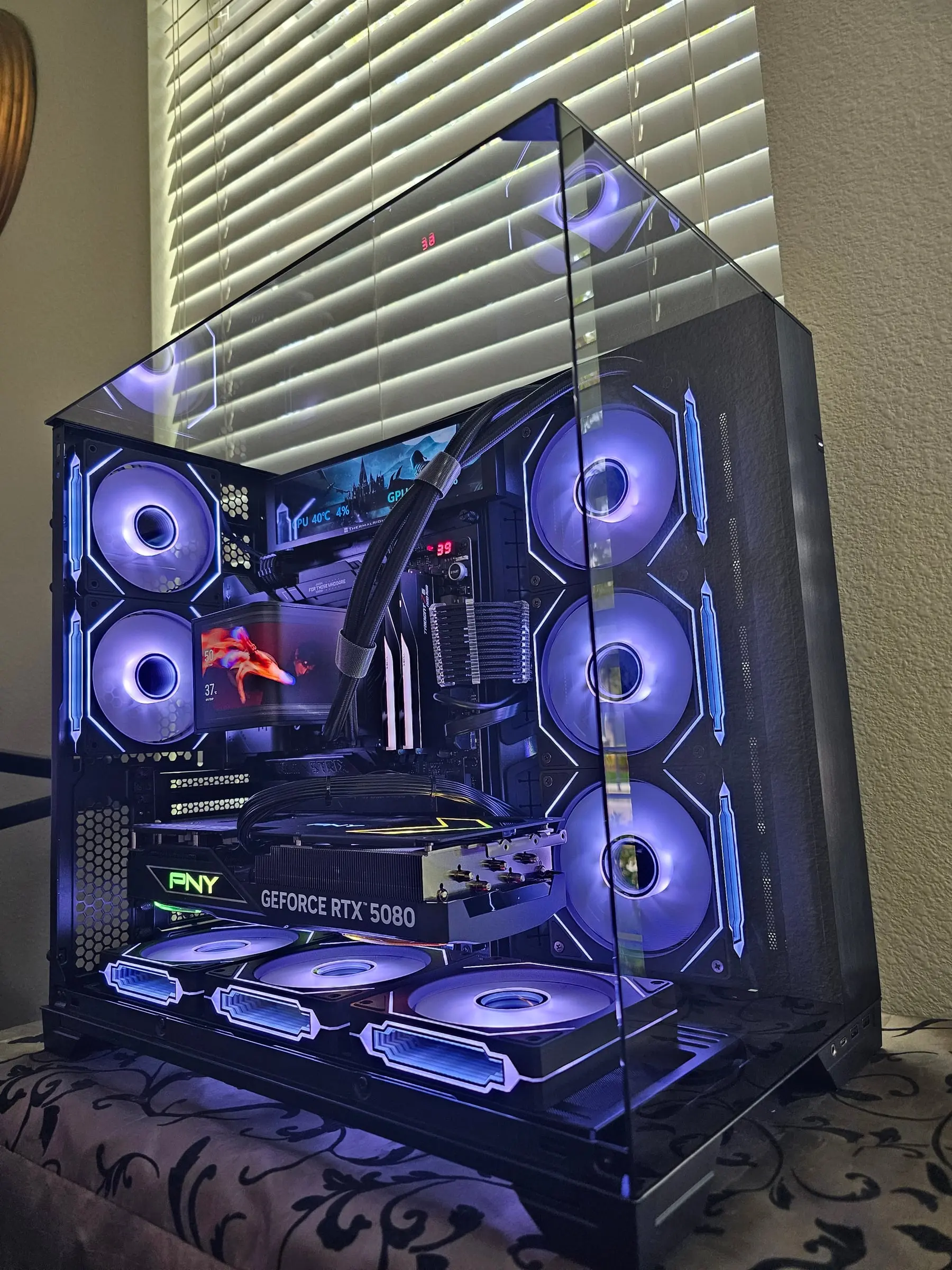 Blue-violet theme with the TRYX curved AMOLED showing art beside the white Trident Z5 Neo sticks