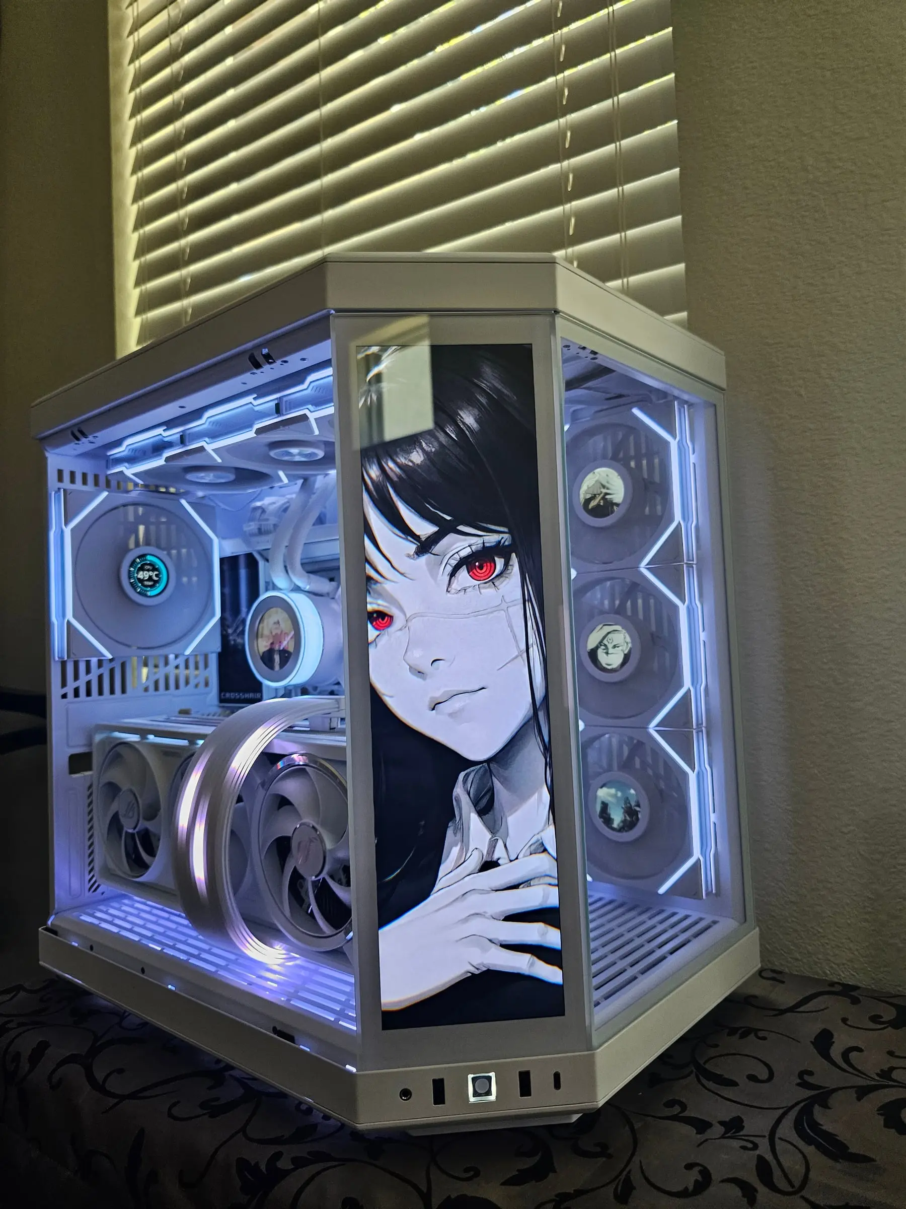 Front touchscreen displaying anime art while TL LCD fans show individual character portraits
