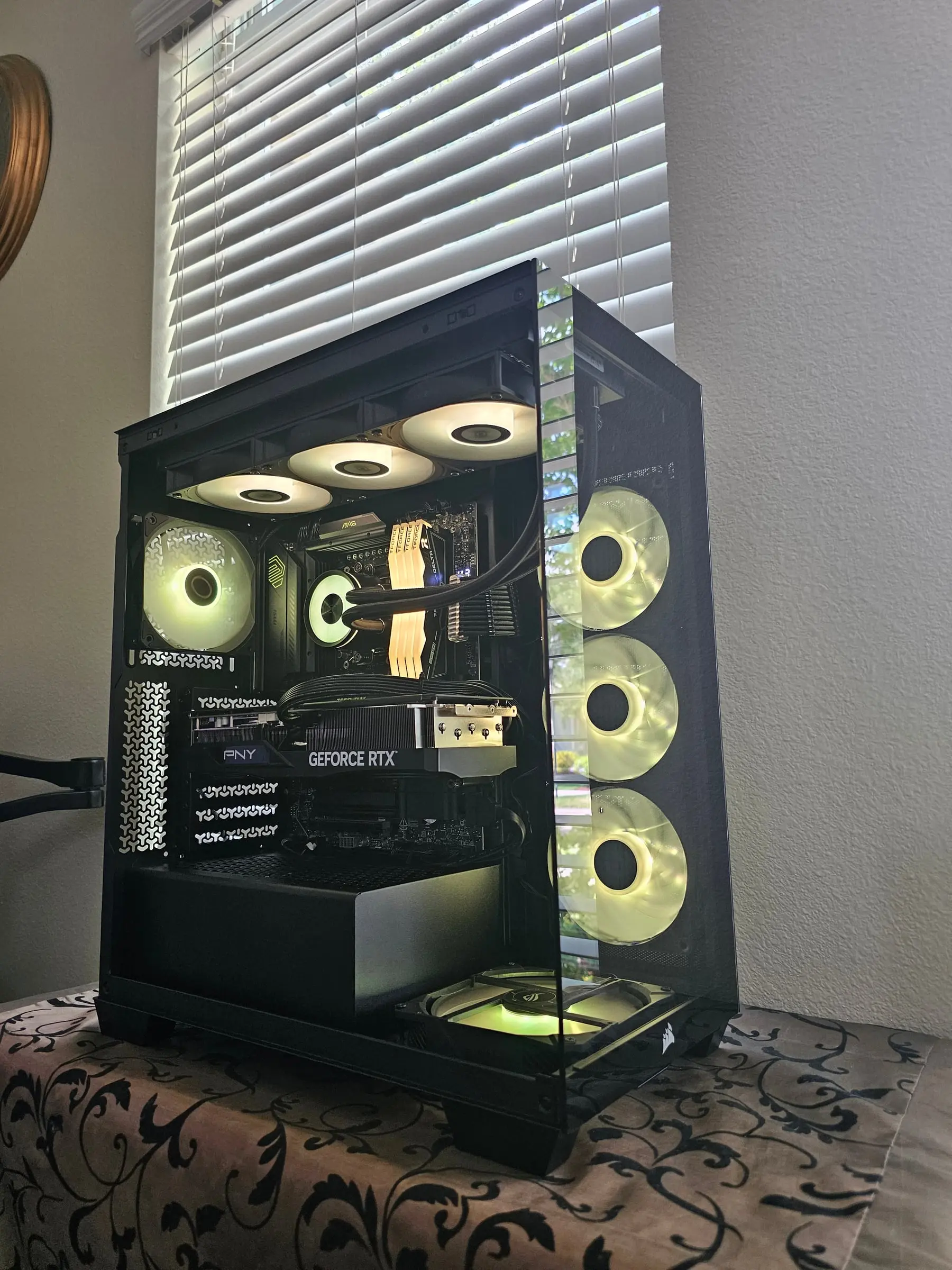 Lime-gold theme with the AIO pump ring and white Delta sticks glowing