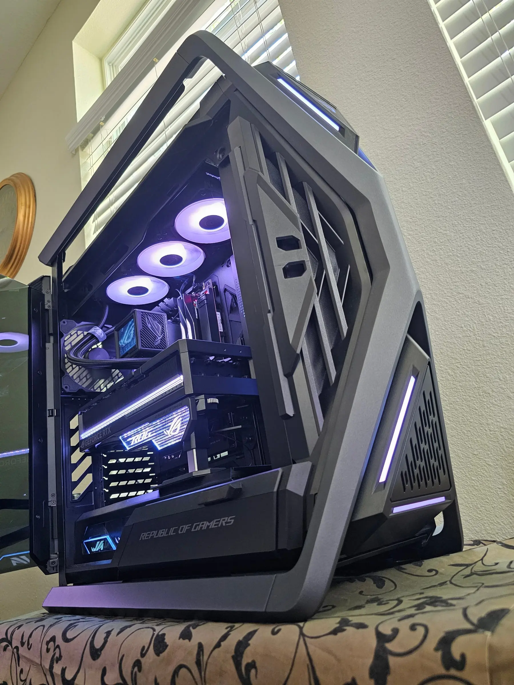 Open door view of the Ryujin III 360 Extreme, Trident RAM, and Astral GPU under white light
