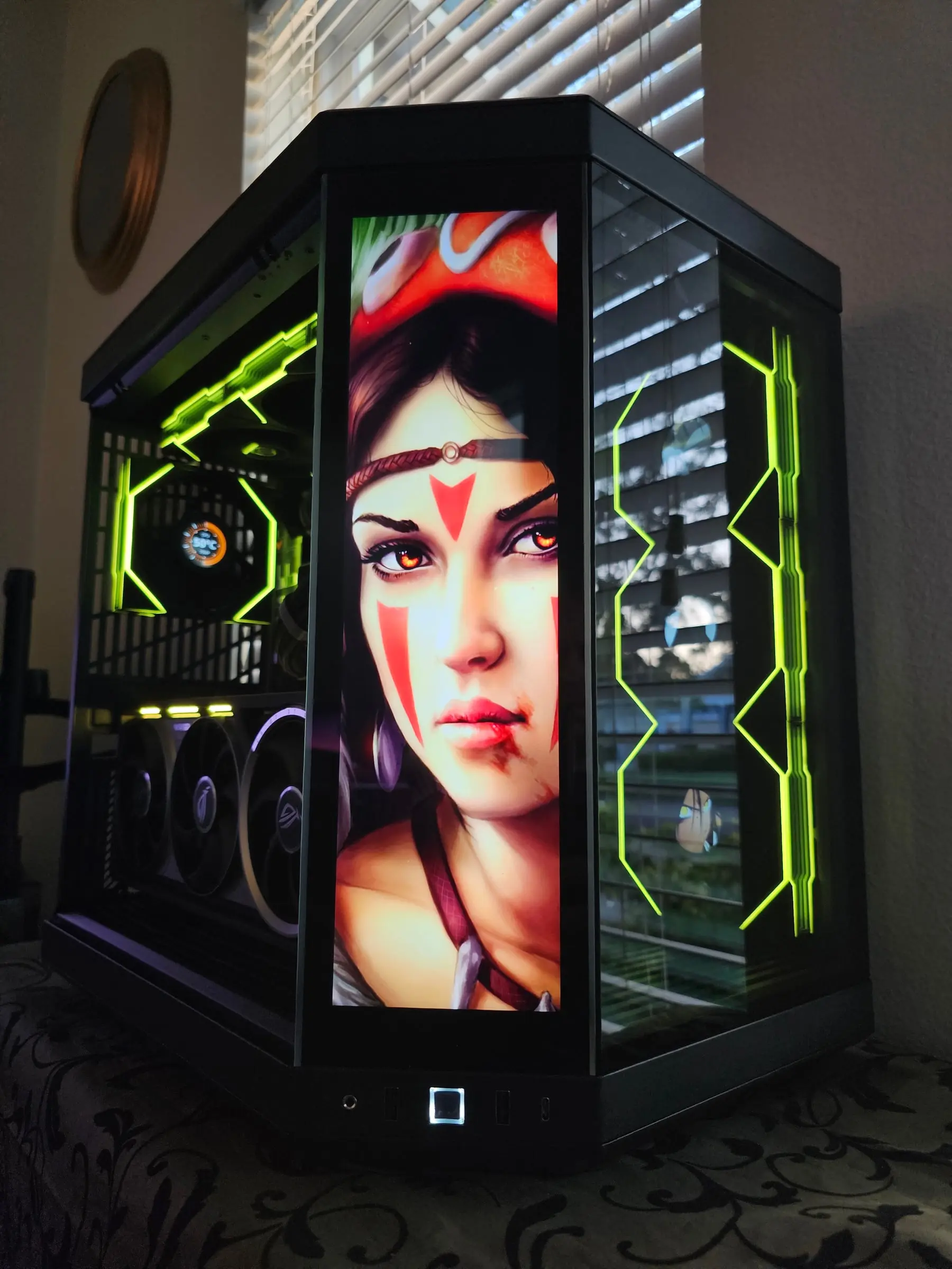 Lime-green theme with Mononoke-style warrior art across the Y70 touchscreen