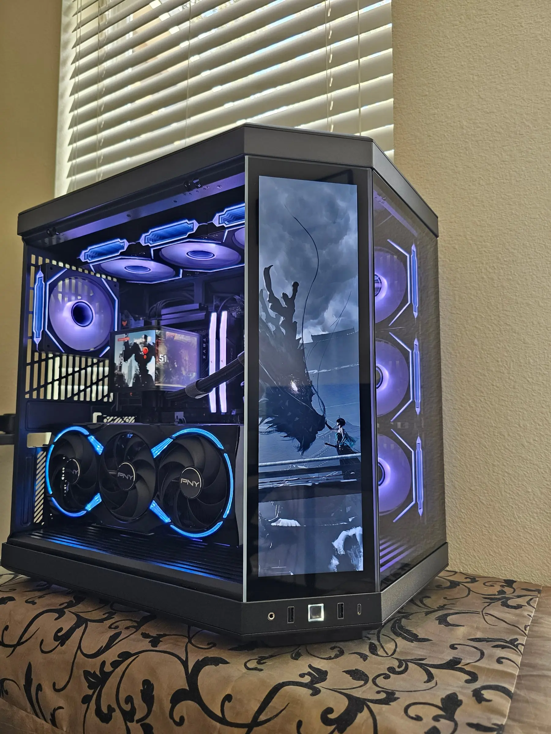 Dragon artwork across the front touchscreen with violet hex fans glowing