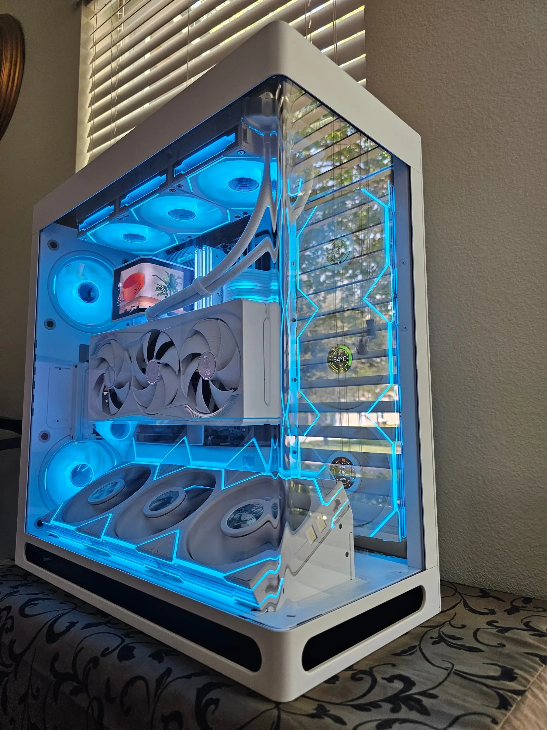 Ice-blue theme over the vertical GPU and the bottom fan LCDs running artwork