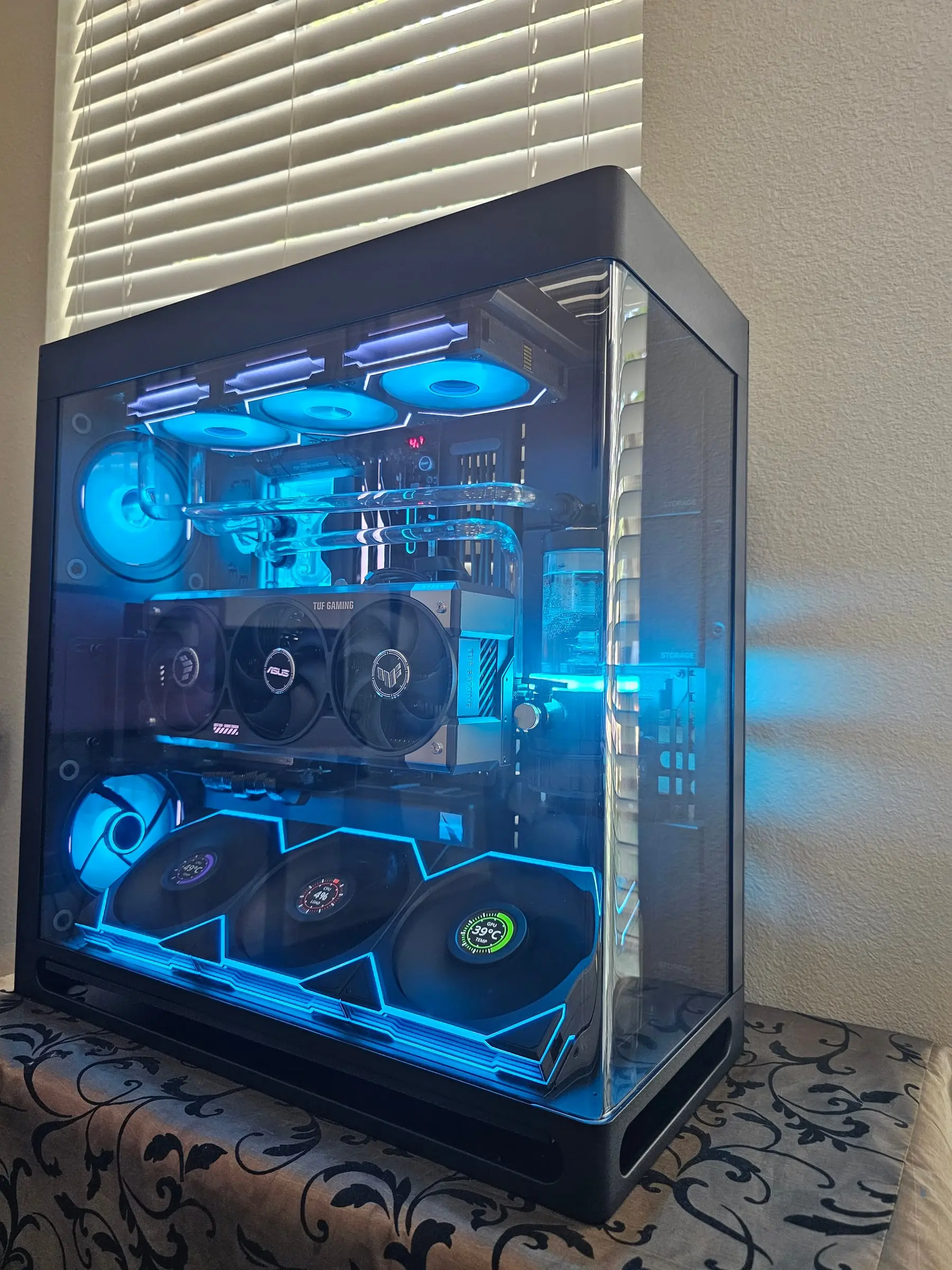 Deep blue theme across the loop, radiator fans, and zigzag fan wall