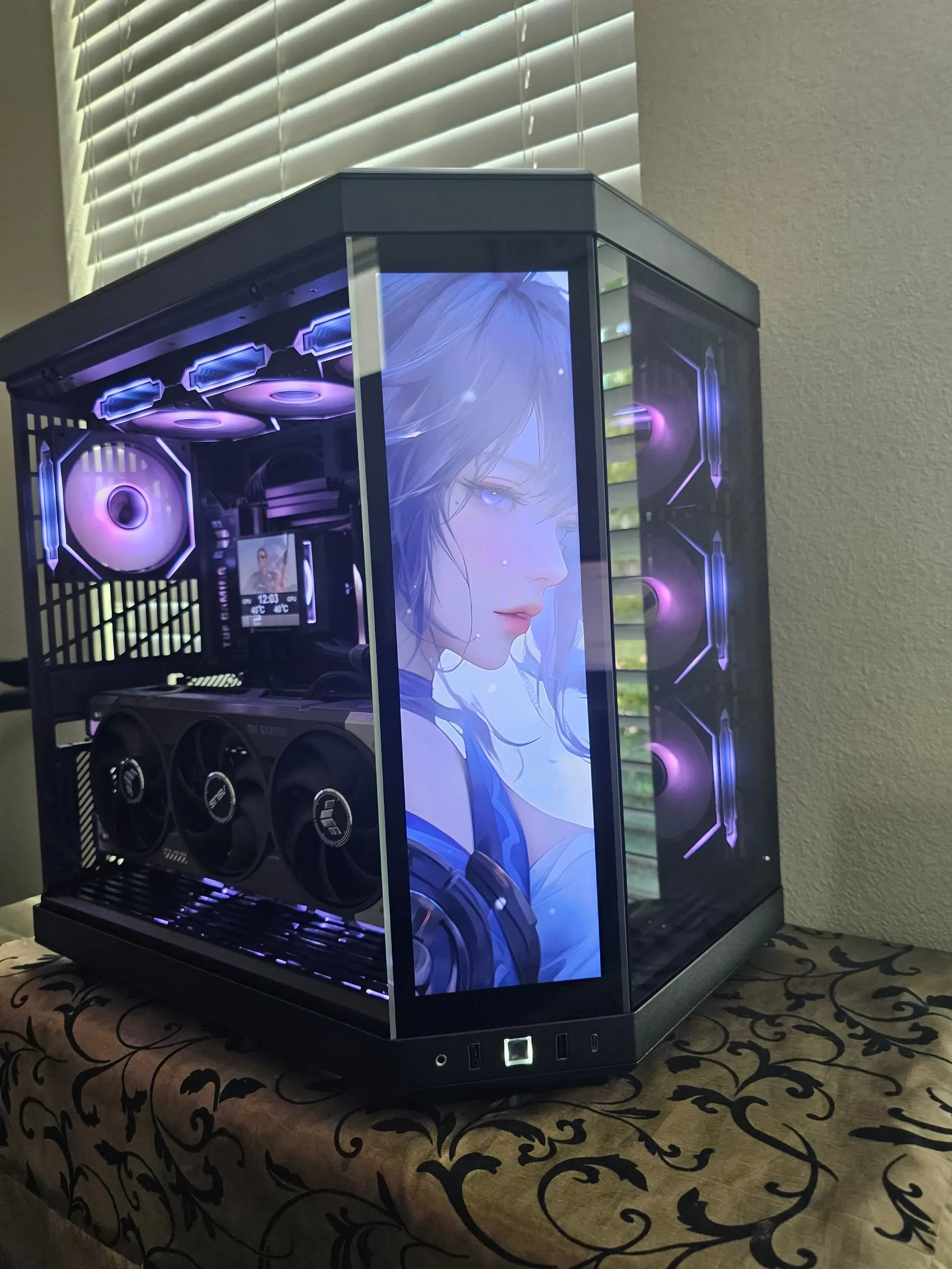 Anime portrait art on the front touchscreen with violet lighting through the panoramic glass