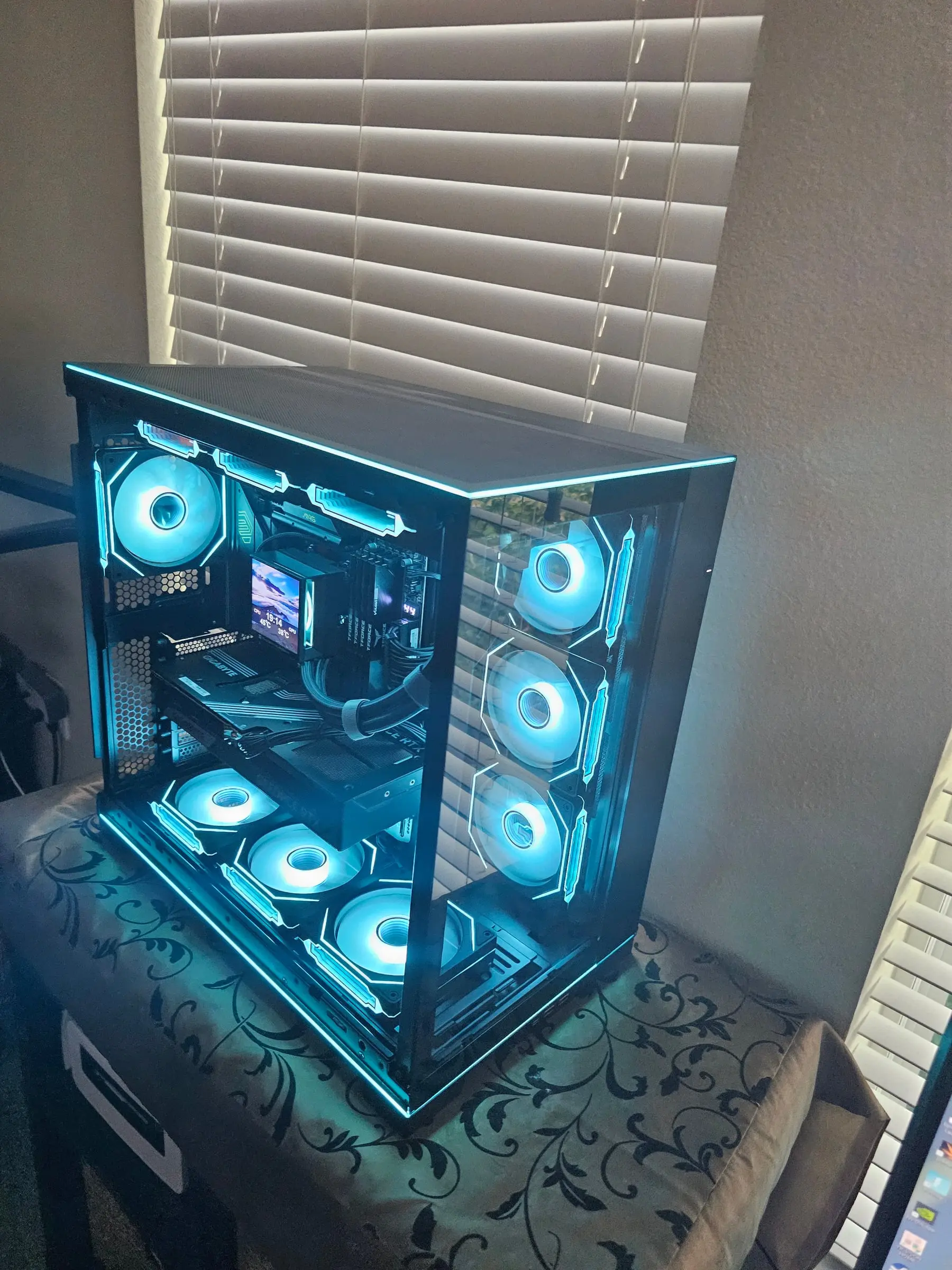 Ice-blue theme across the fan wall and the bottom intake row