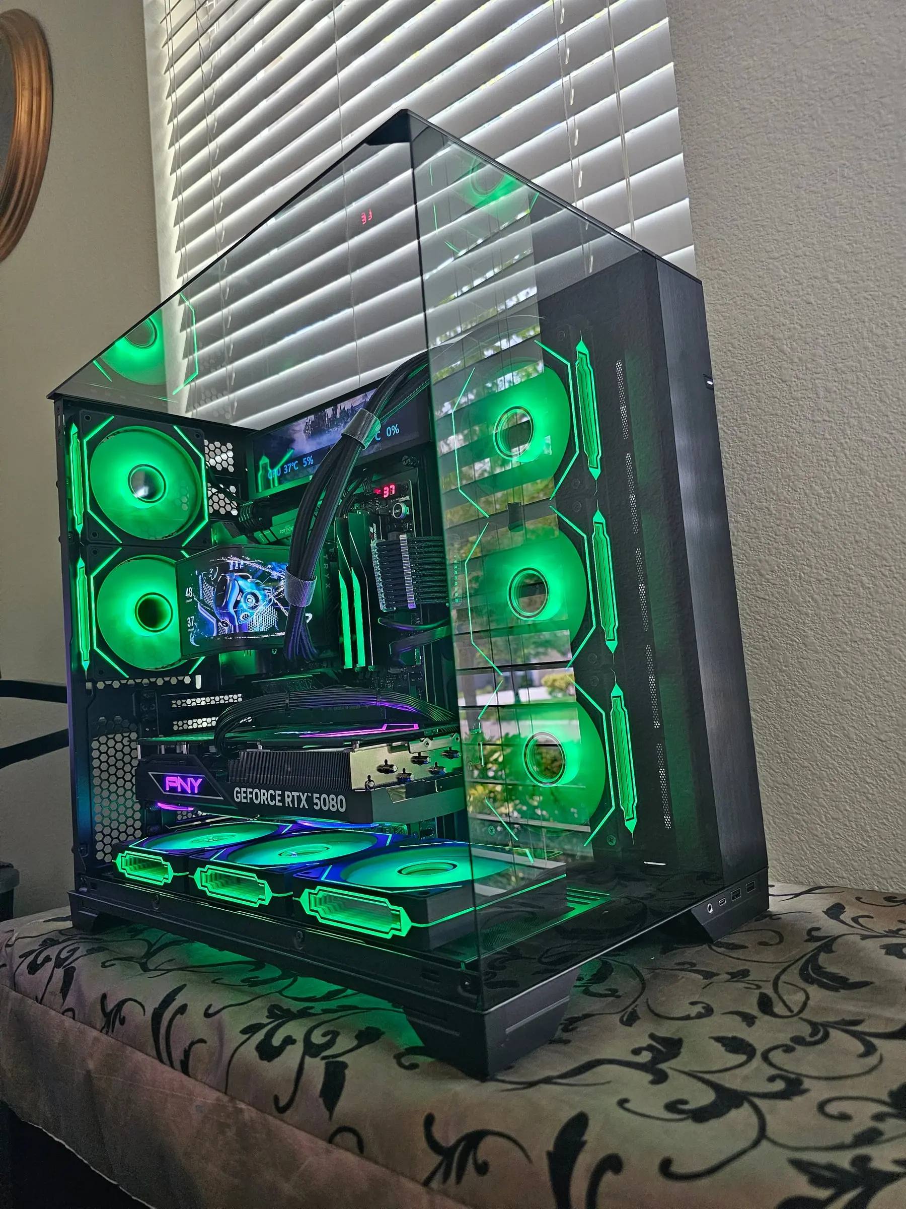 Green theme across all eight infinity-mirror fans with both screens running game art