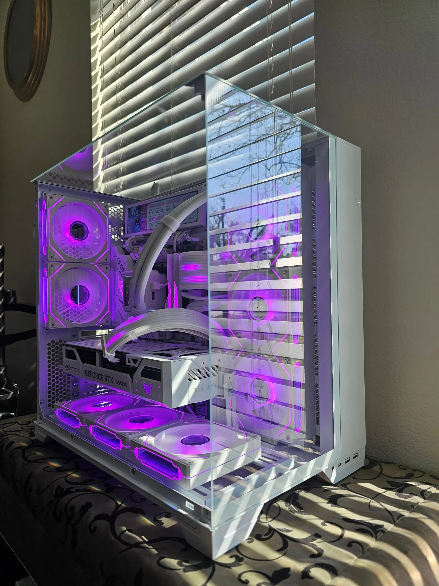 Purple theme — dance artwork on the sensor panel, violet halos on every fan
