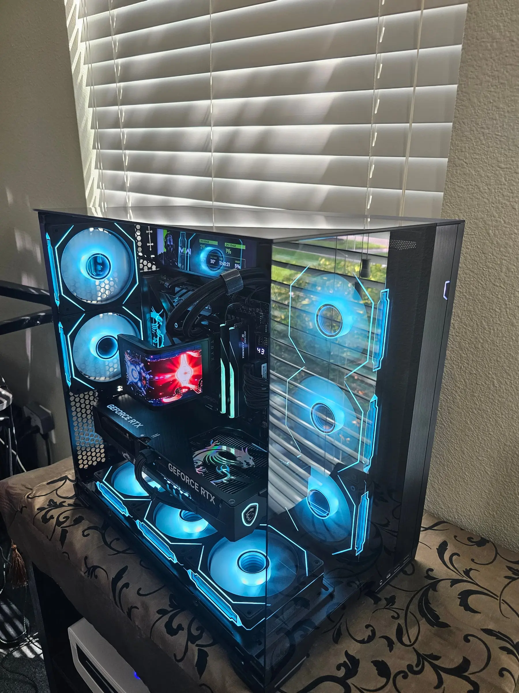 Cyan theme with the MSI dragon shimmering on the Gaming Trio backplate