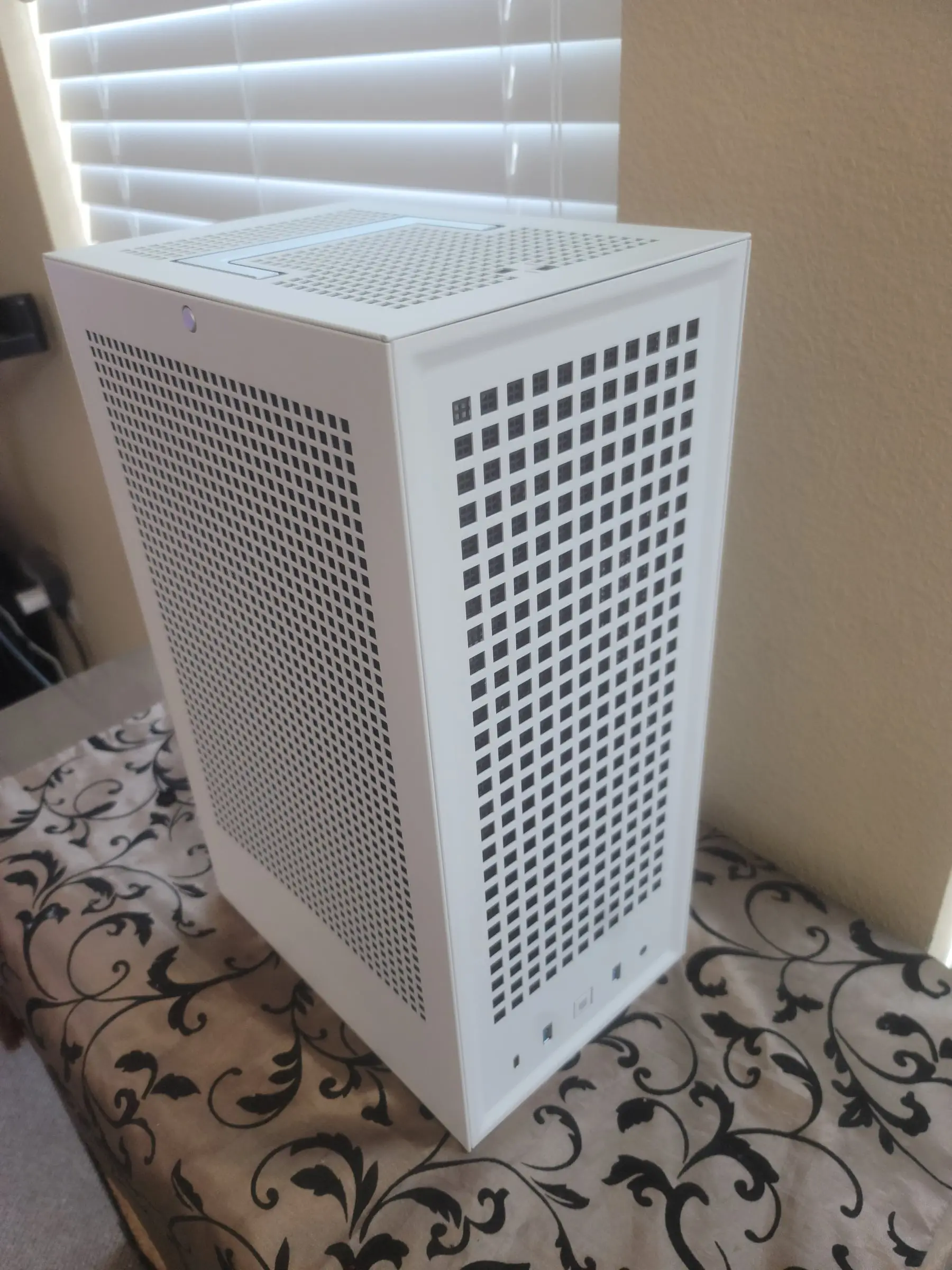 Top angle showing the vented crown and clean white panels