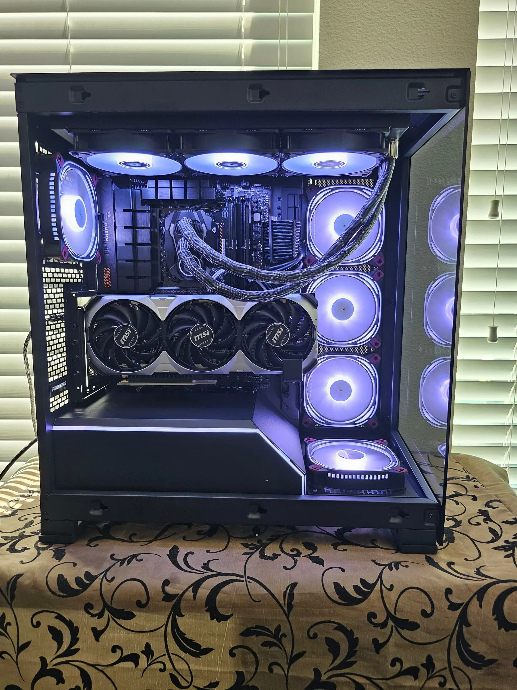 Lime-gold theme over the fan wall and the GPU's silver shroud