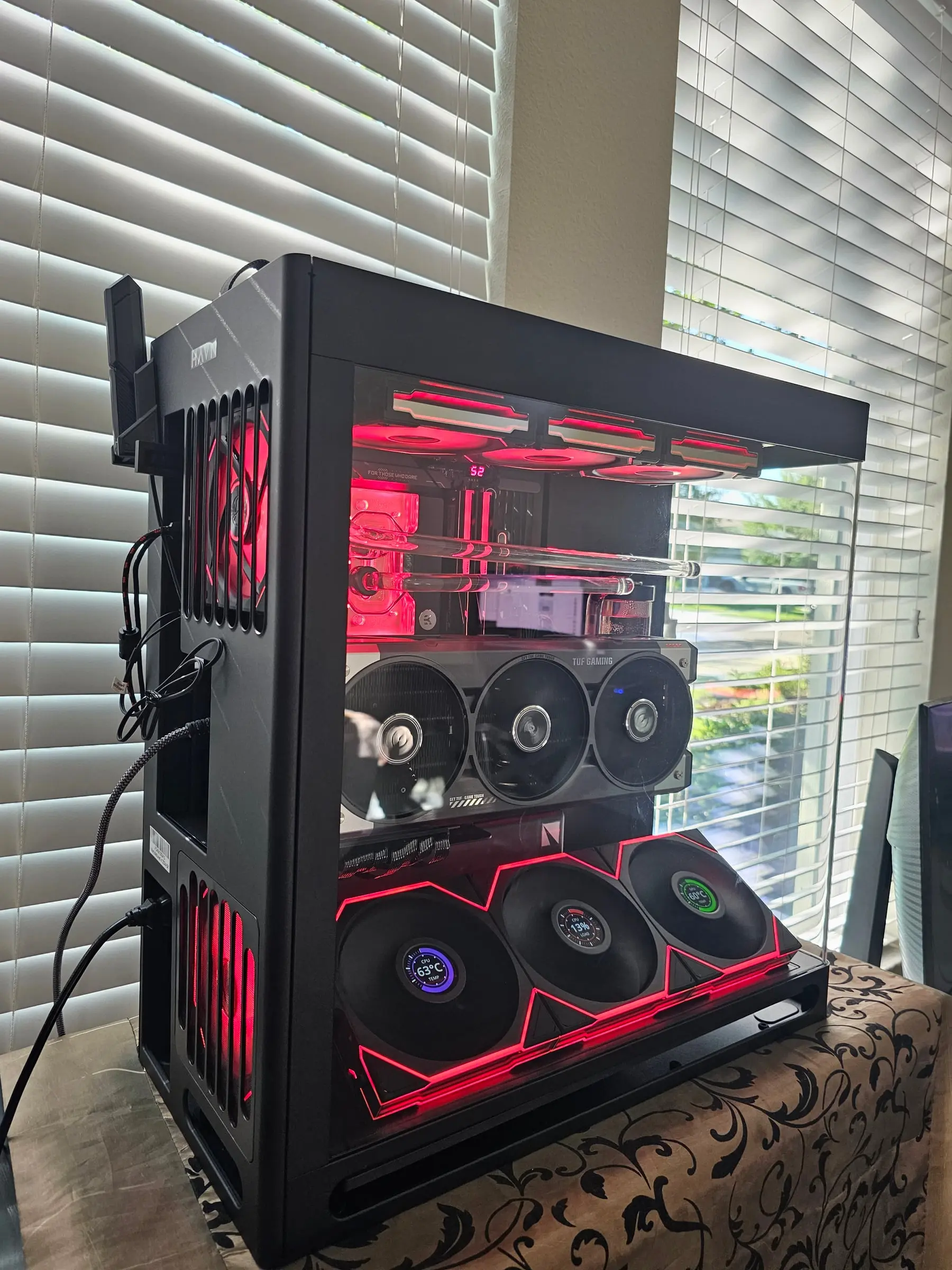 Red theme — EK block and reservoir crimson, TL LCD dials reading load temps