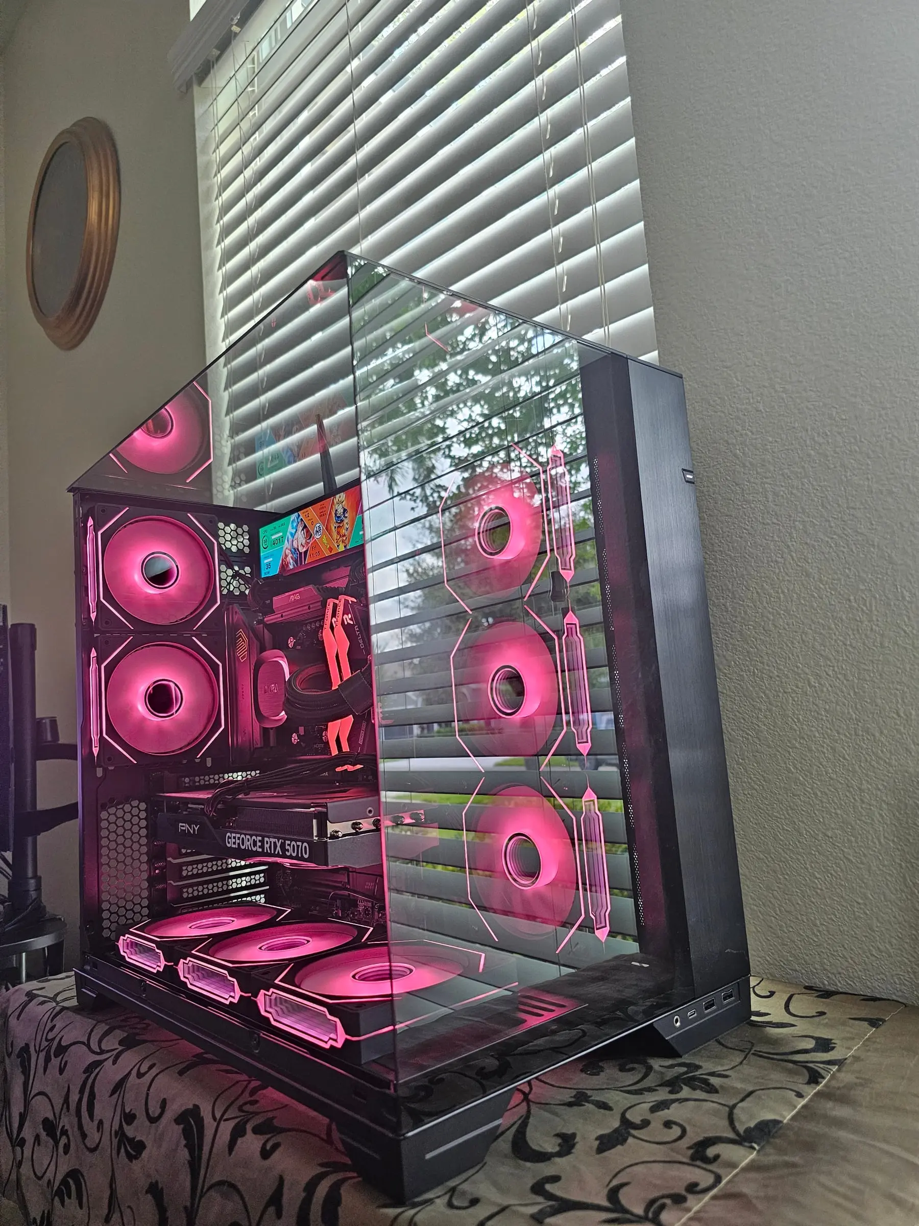 Hot pink theme across all eight fans and the bottom intake row