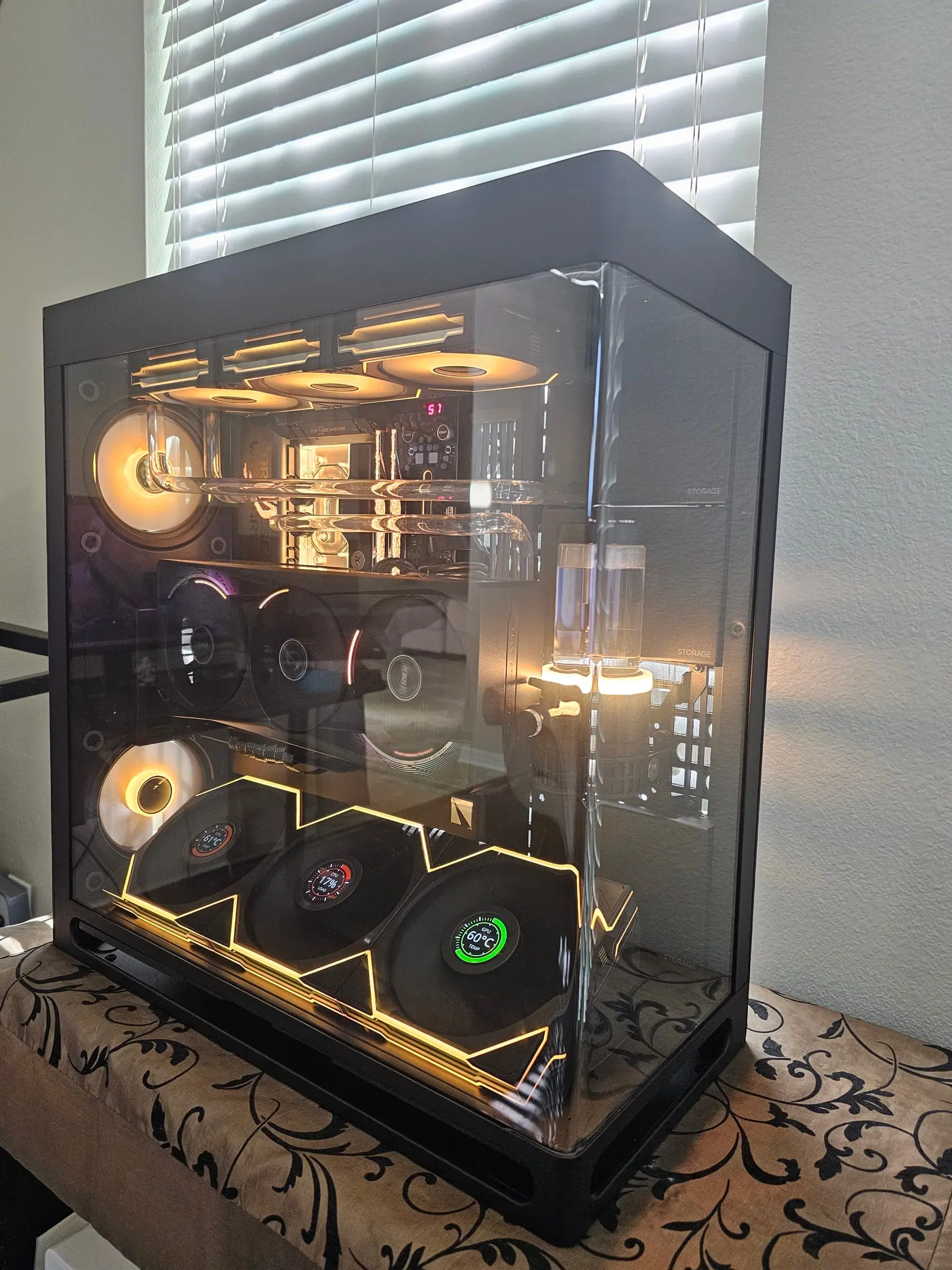 Deep blue theme — acrylic runs, glowing reservoir, and TL LCD dials reading CPU and GPU