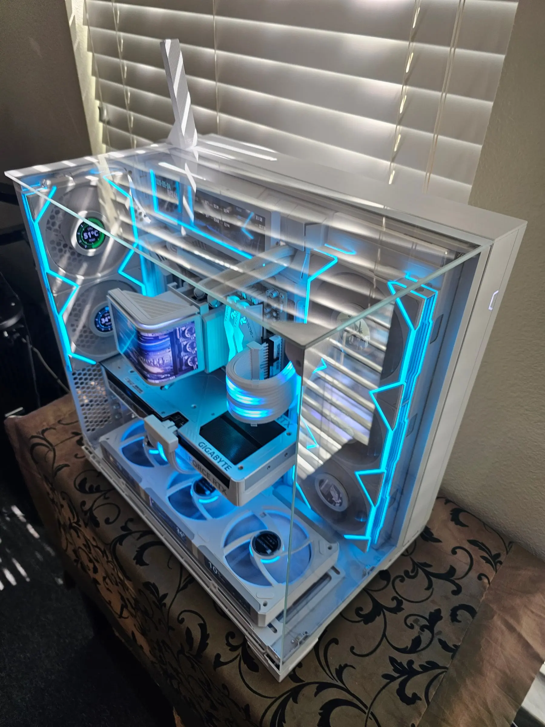 Cyan overhead with the antenna up and dashboards glowing through the roof glass