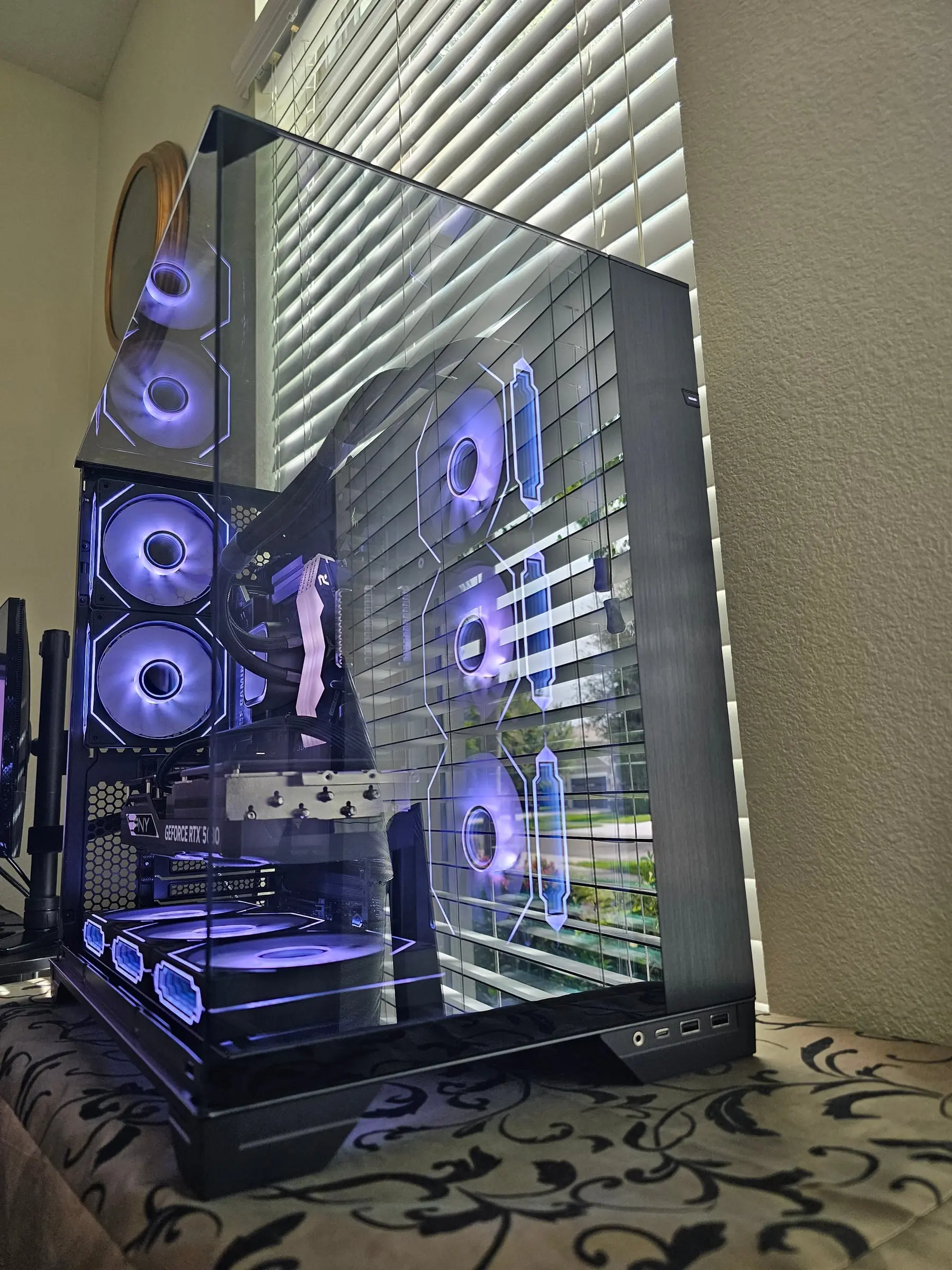 Blue-violet three-quarter view from the right with all eight fans synced