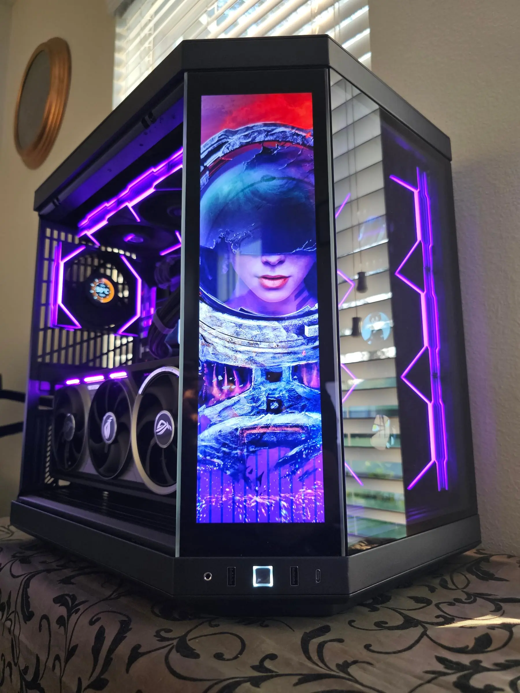 Purple theme with astronaut artwork filling the front display