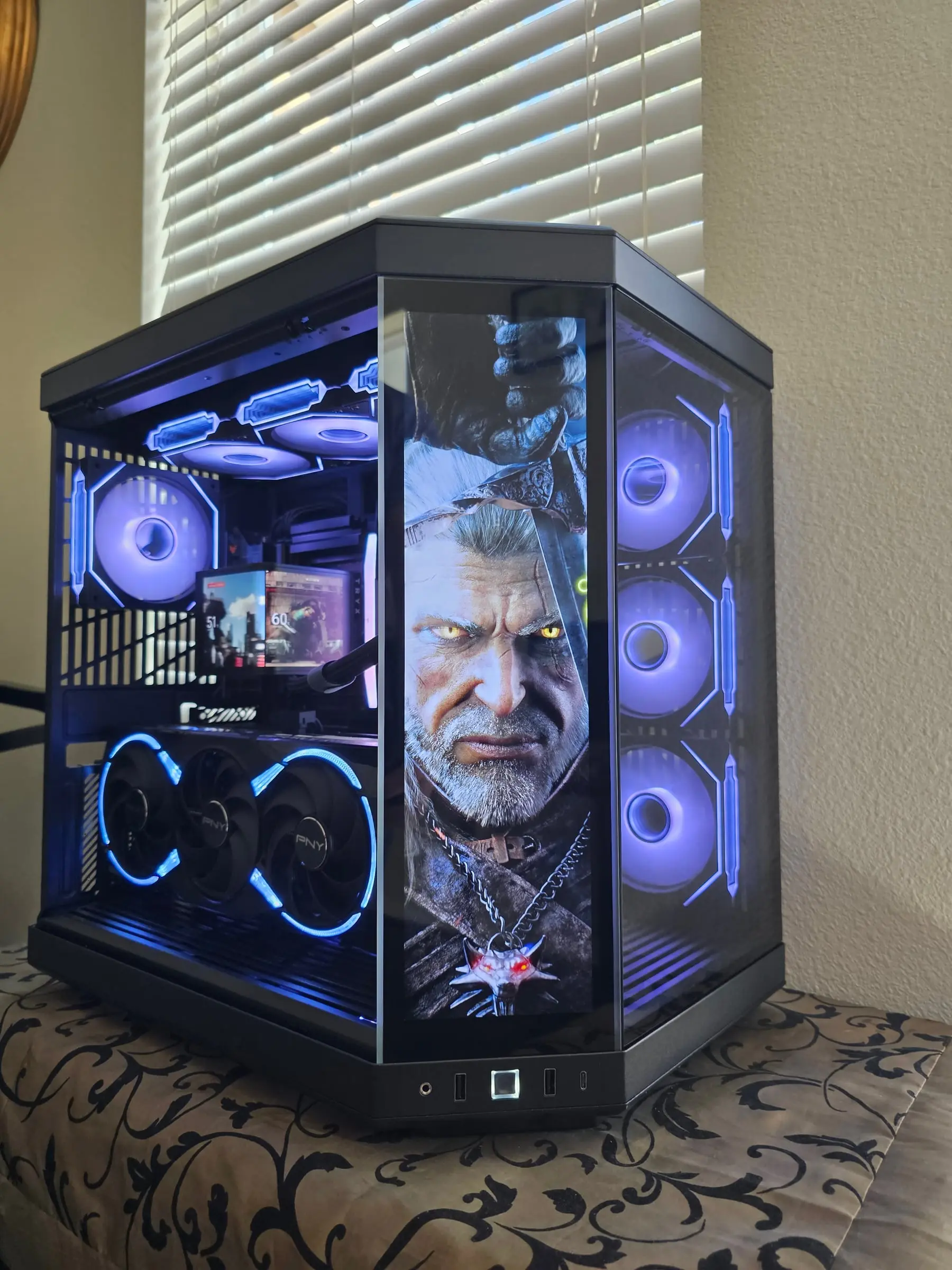 Showcase view of the finished Y70 Touch build with all screens running art
