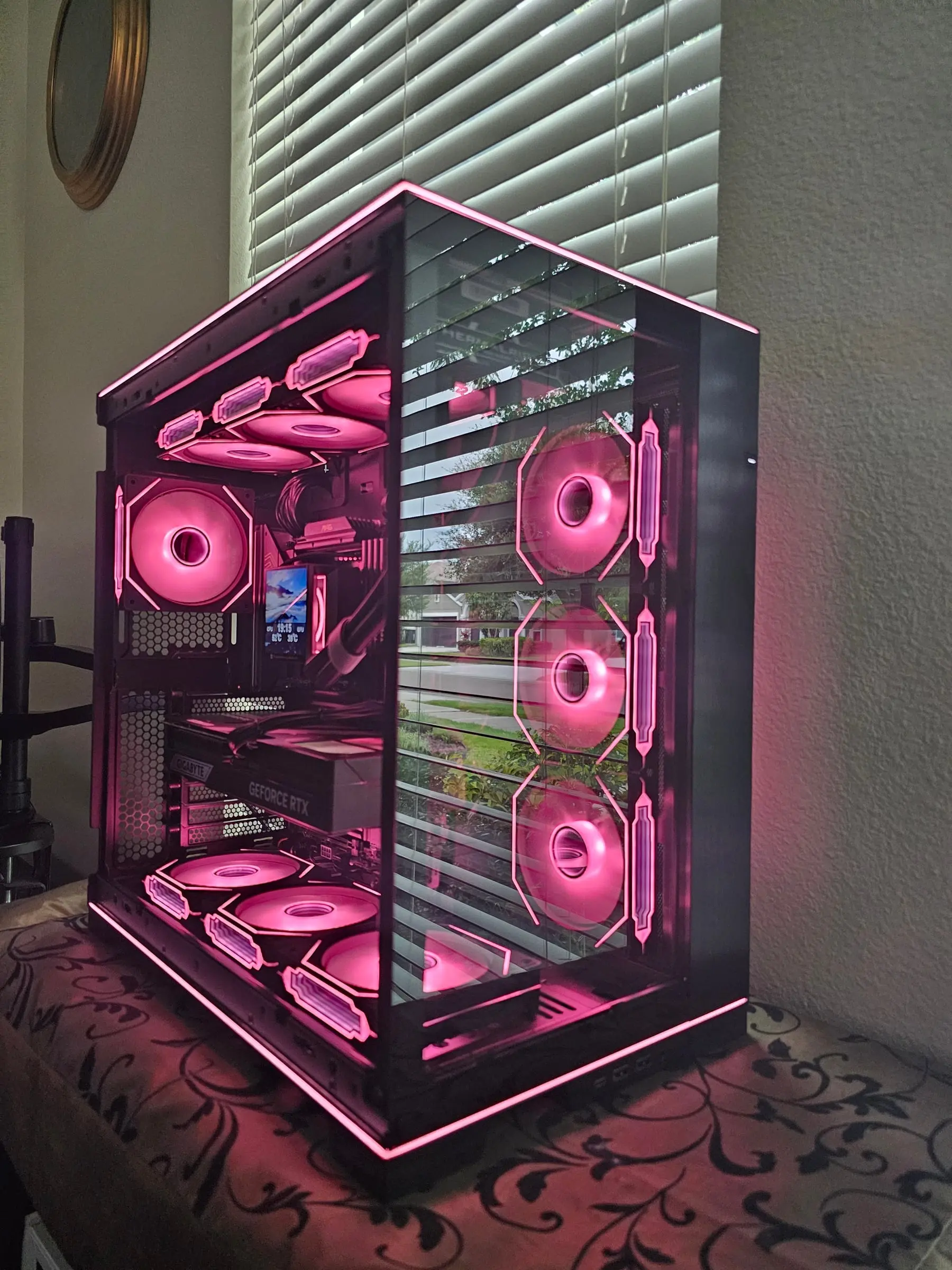 Magenta showcase view of the finished O11 Dynamic EVO RGB build