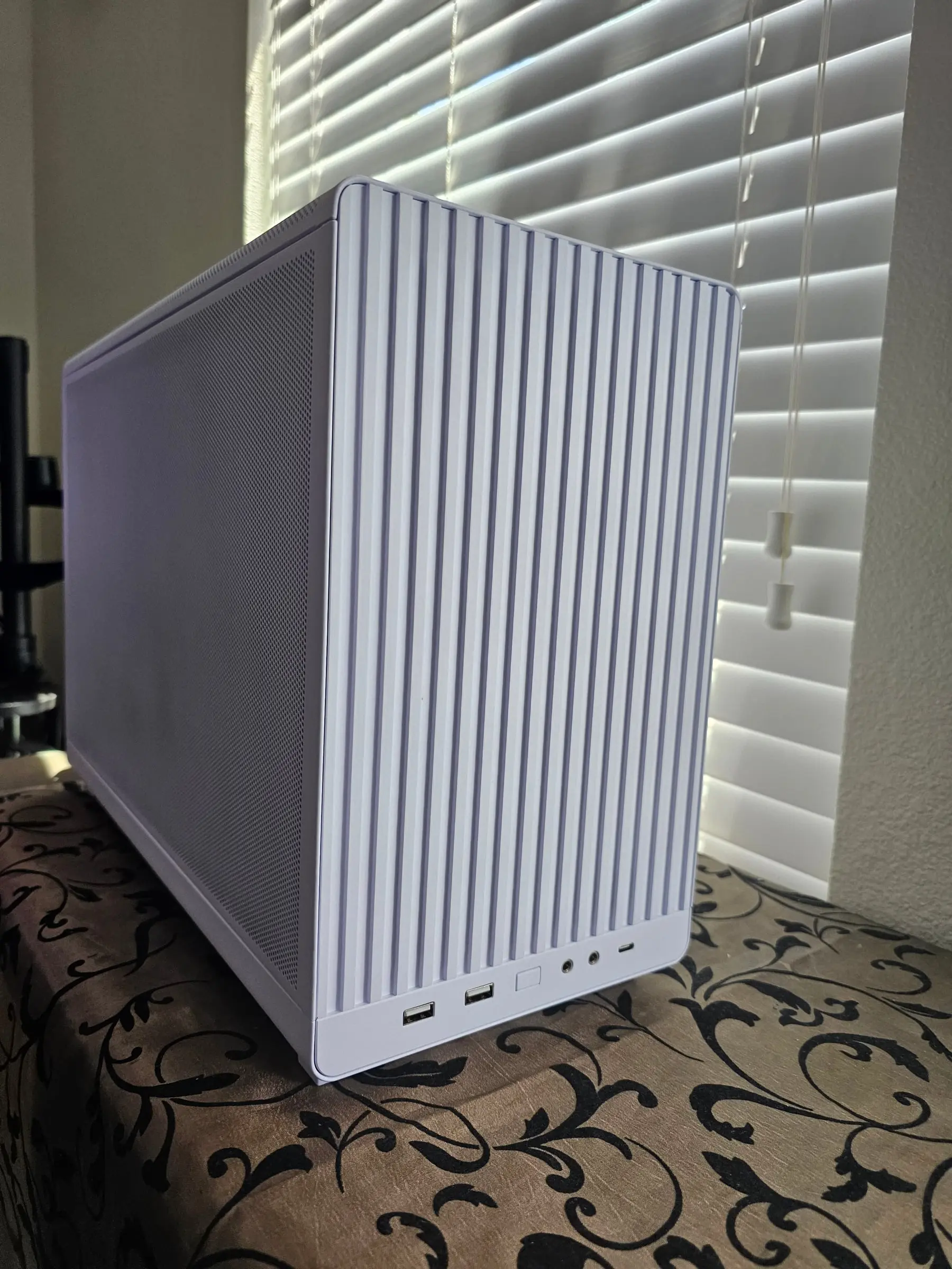 Lian Li A3 White top panel with front ports, seen from the front corner