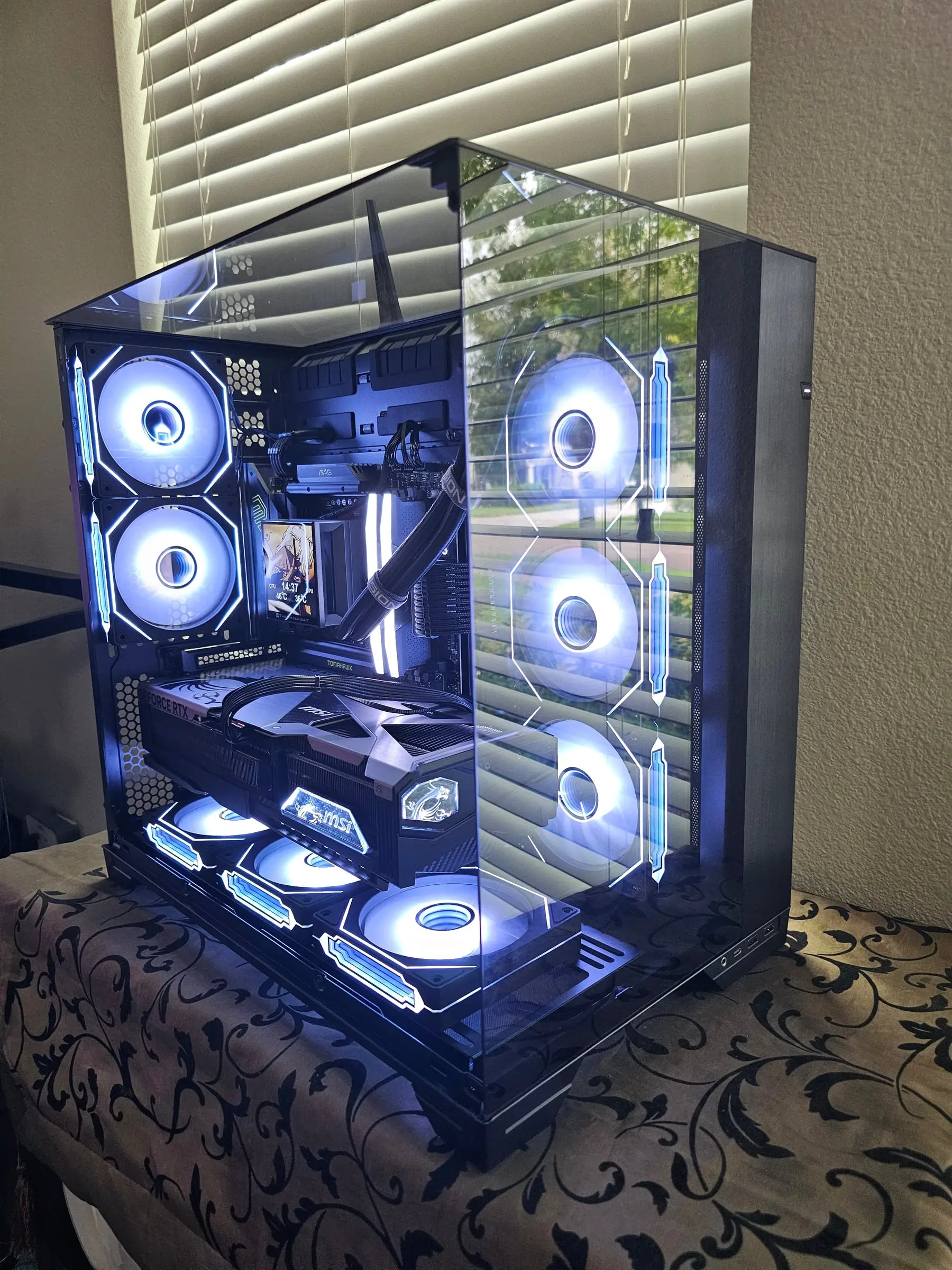 Clean white theme — the all-black O11 Vision build lit like a showcase cabinet
