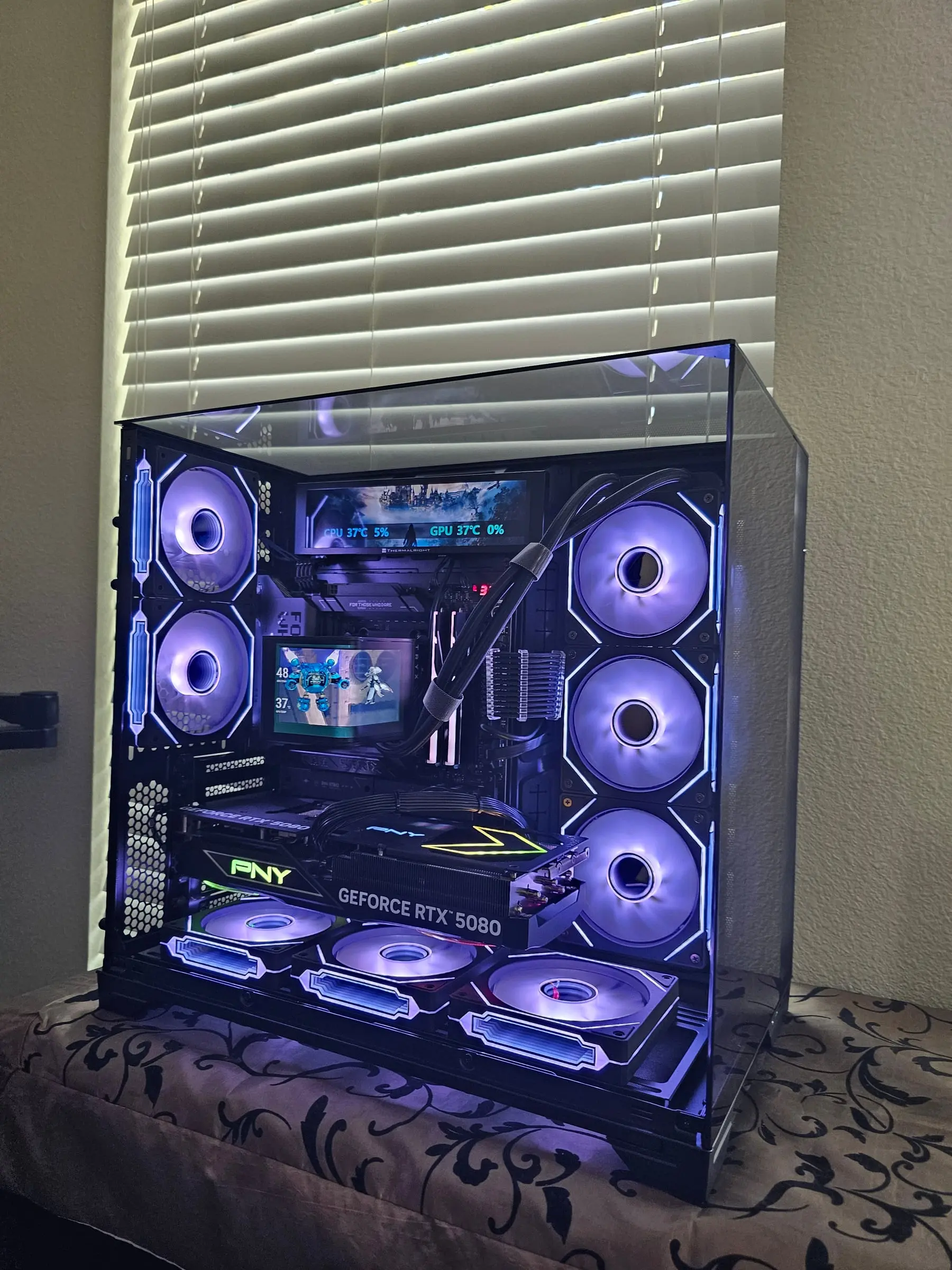 Violet showcase view of the finished dual-screen O11 Vision build