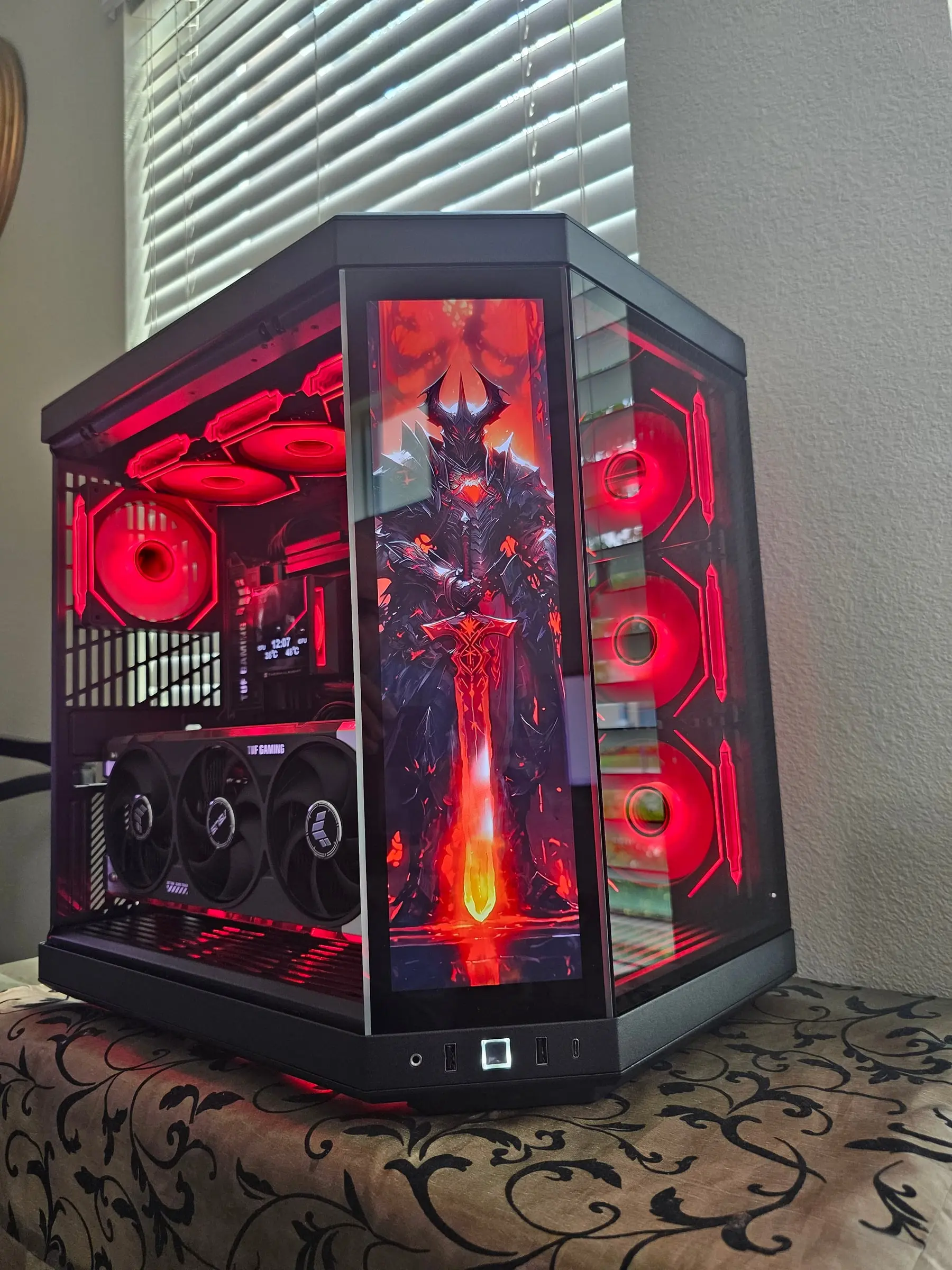 Red theme with dark knight and flaming sword art on the front display, red Prism fans
